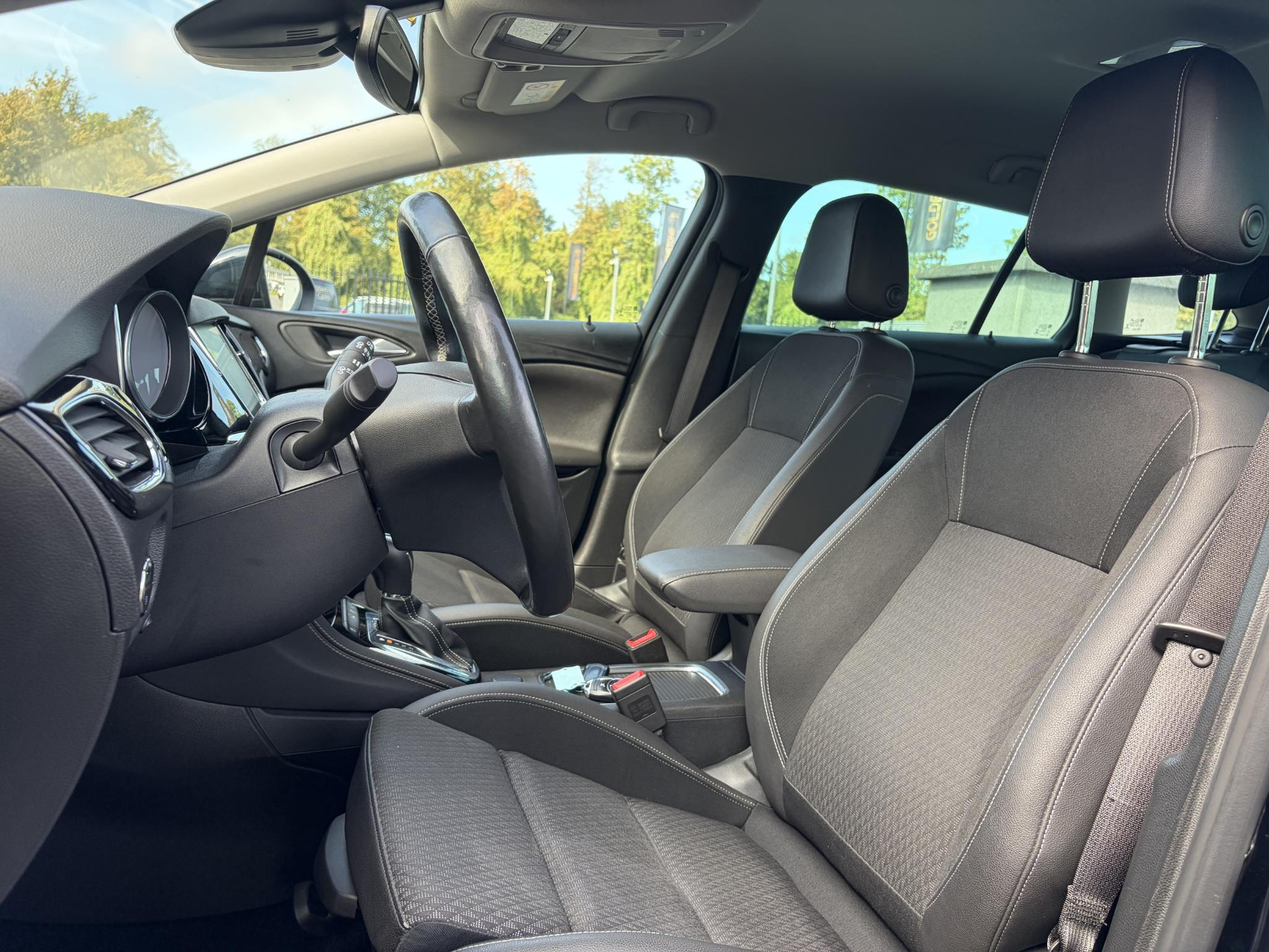 Opel Astra Sports Tourer 1.4 Business Executive ✓2 Eigenaar✓Camera✓Navi✓Trekhaakt✓Carplay✓Stoelverw✓Stuurverw✓Automaat✓Dealer Onderhouden✓Keyless✓Clima✓Cruise✓Pdc V+A✓Halfleder✓Comfortstoelen✓150pk✓Rijstrooksensor✓Dodehoeksensor✓Elekt Stoelen✓Lm velgen✓N.