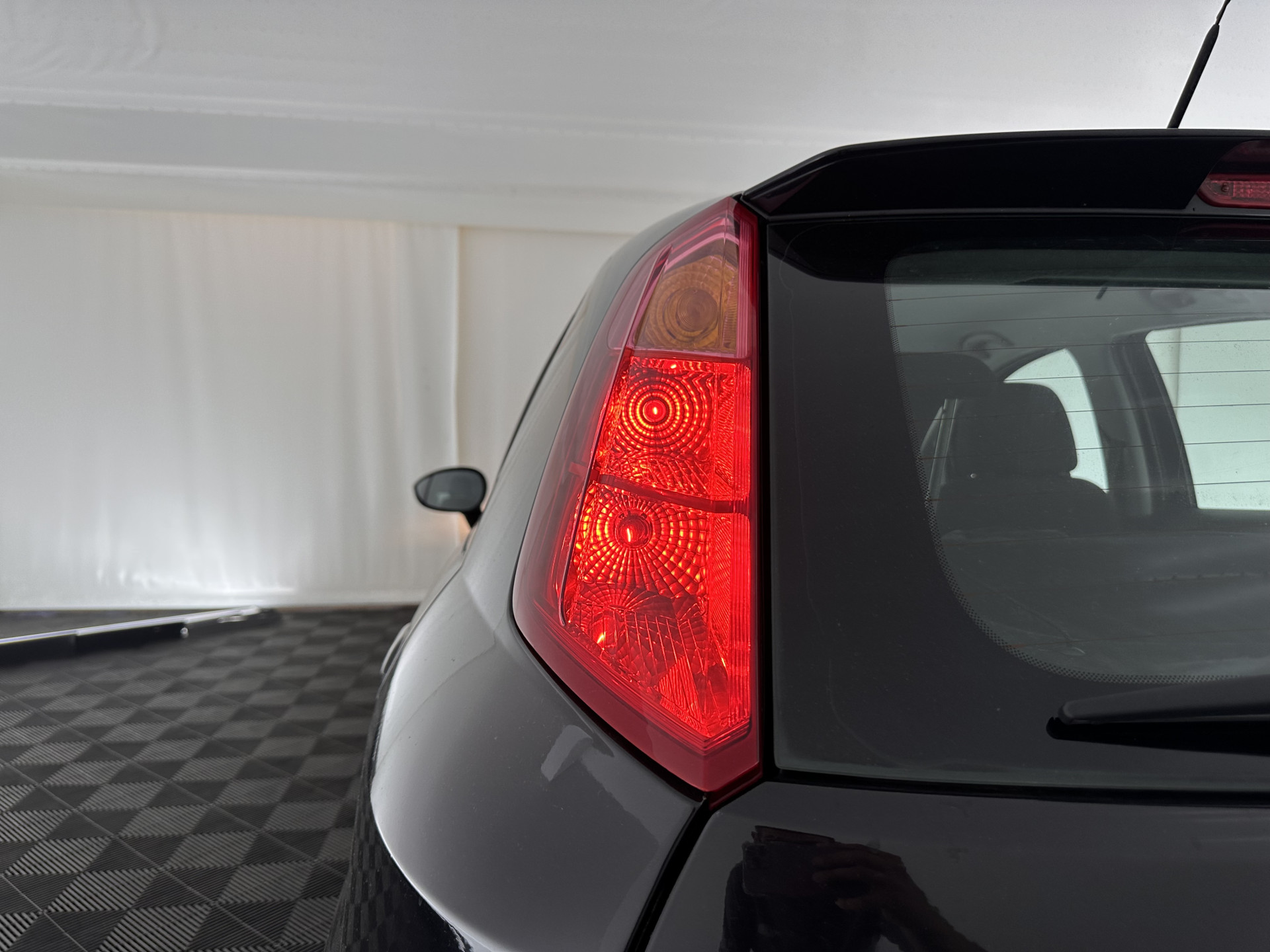 Fiat Punto Evo 1.3 M-Jet Street Pack-Easy *AIRCO | CRUISE | COMFORT-SEATS | SIDE-SKIRTS | PDC | TOWBAR | RADIO-CD | 15"ALU*