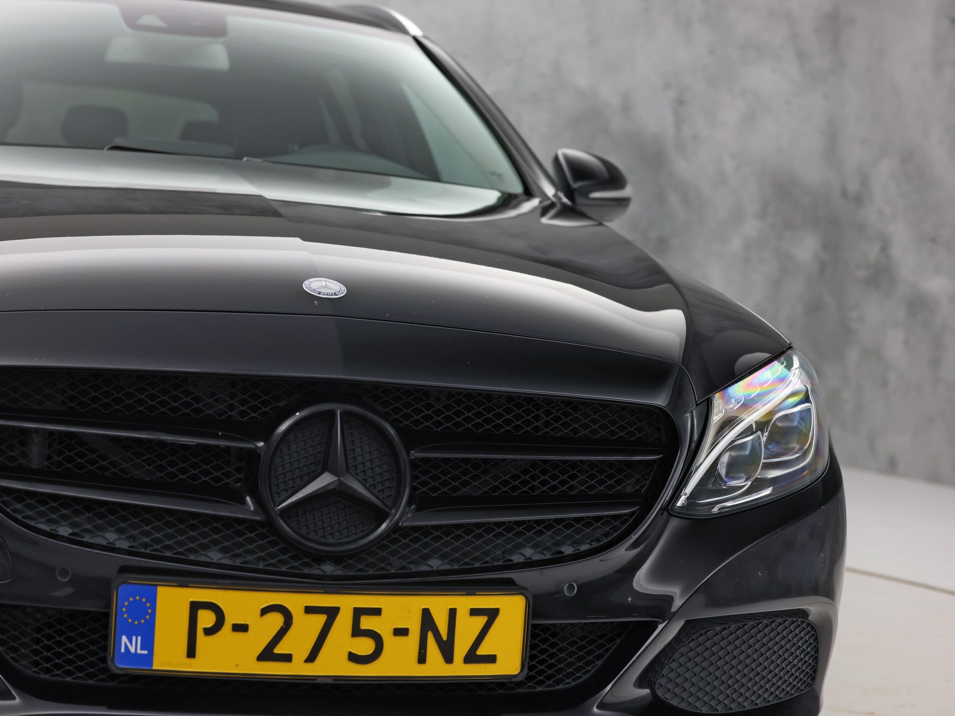 Mercedes-Benz C-Klasse 180 AMG Sport Automaat (GROOT NAVI, LEDER, STOELVERWARMING, GETINT GLAS, SPORTSTOELEN, CRUISE, NIEUWE APK, NIEUWSTAAT)