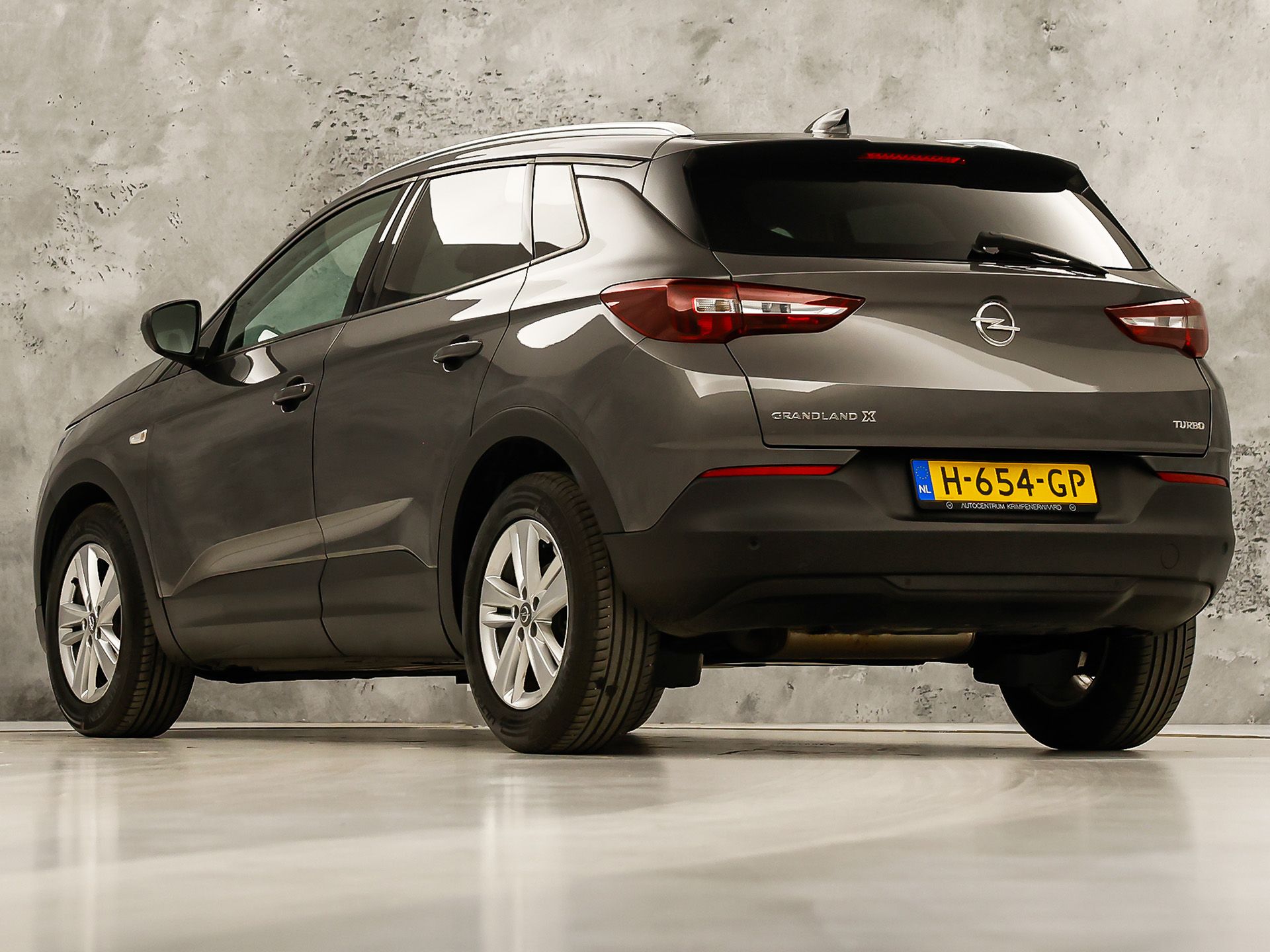 Opel Grandland X 1.2 Turbo Sport Automaat (APPLE CARPLAY, GROOT NAVI, CLIMATE, STUUR/STOELVERWARMING, SPORTSTOELEN, PARKEERSENSOREN, GETINT GLAS, CRUISE, NIEUWSTAAT)