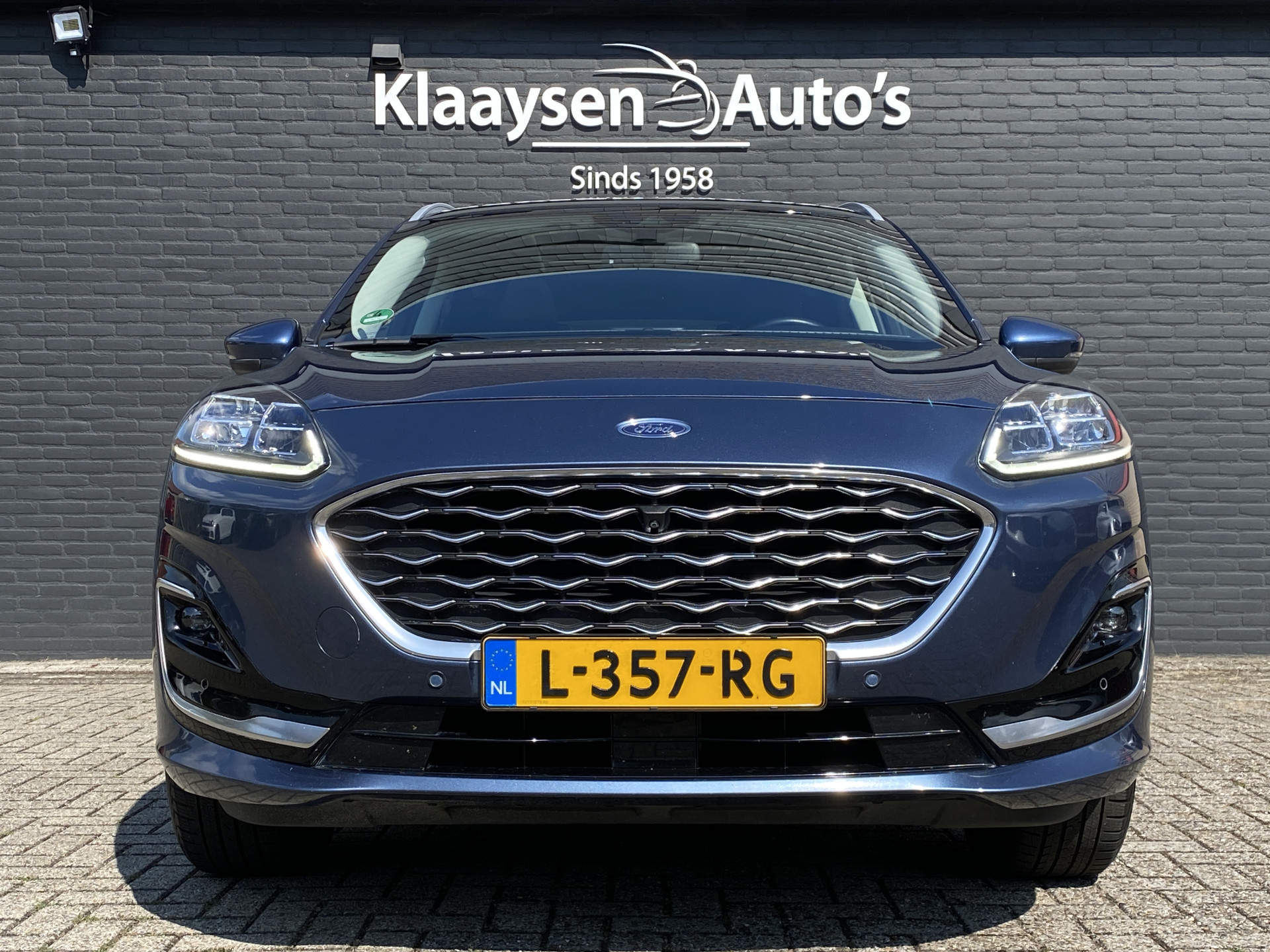 Ford Kuga 2.5 PHEV Vignale 225 pk | dealer onderh. | panoramadak | leder interieur | elektr. v. stoelen | navigatie | B&O audio