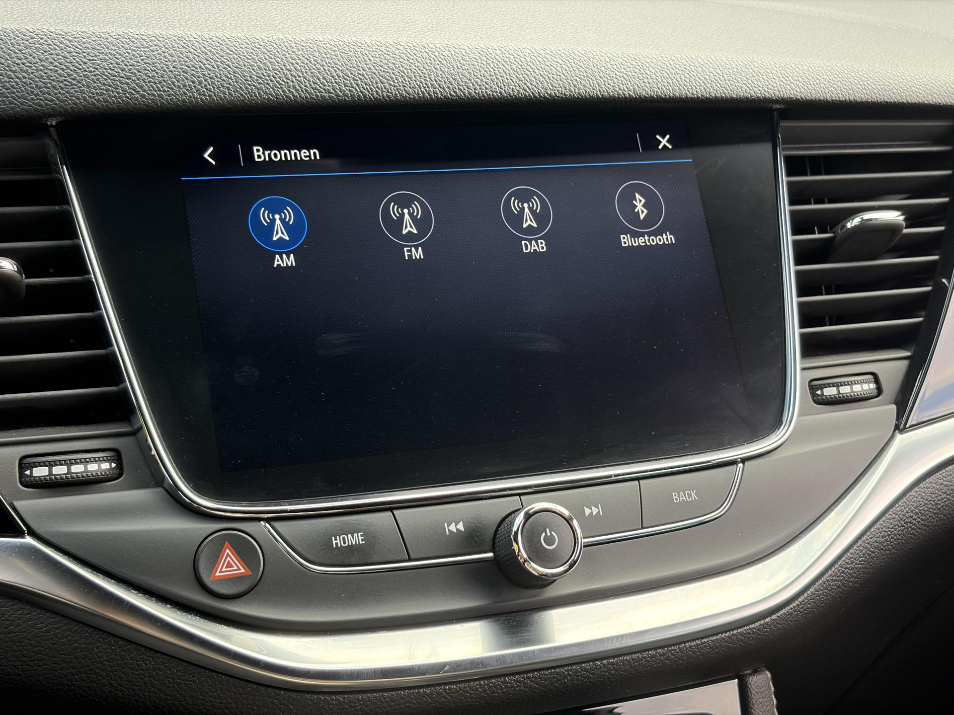Opel Astra Sports Tourer 1.2 Ultimate ✓146pk✓Carplay✓Camera✓Stoelverw✓Stuurverw✓Keyless✓Pdc V+A✓Alcantara-Leder✓Clima✓Cruise✓6 Bak✓Rijstrooksensor✓Dodehoeksensor✓17''Lm velgen✓N.A.P✓Apk tot 11-2028