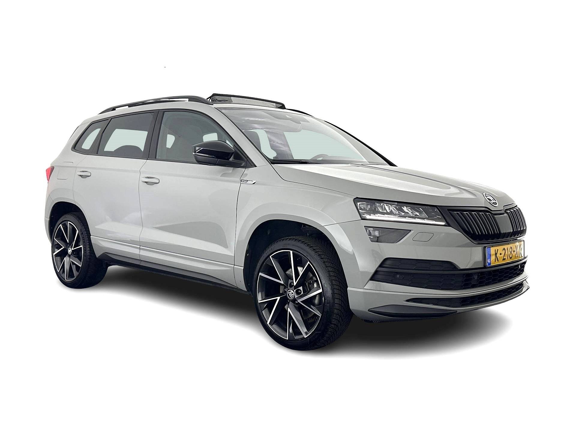 ŠKODA Karoq 1.5 TSI ACT Sportline Business (INCL-BTW) Aut. *PANO | DIGI-COCKPIT | FULL-LED | ADAPTIVE-CRUISE | CANTON-AUDIO | BLINDSPOT | HEATED-SPORTSEATS | CAMERA | AMBIENTLIGHT | NAVI-FULLMAP | KEYLESS | DAB+ | TOWBAR | PRIVACYGLAS