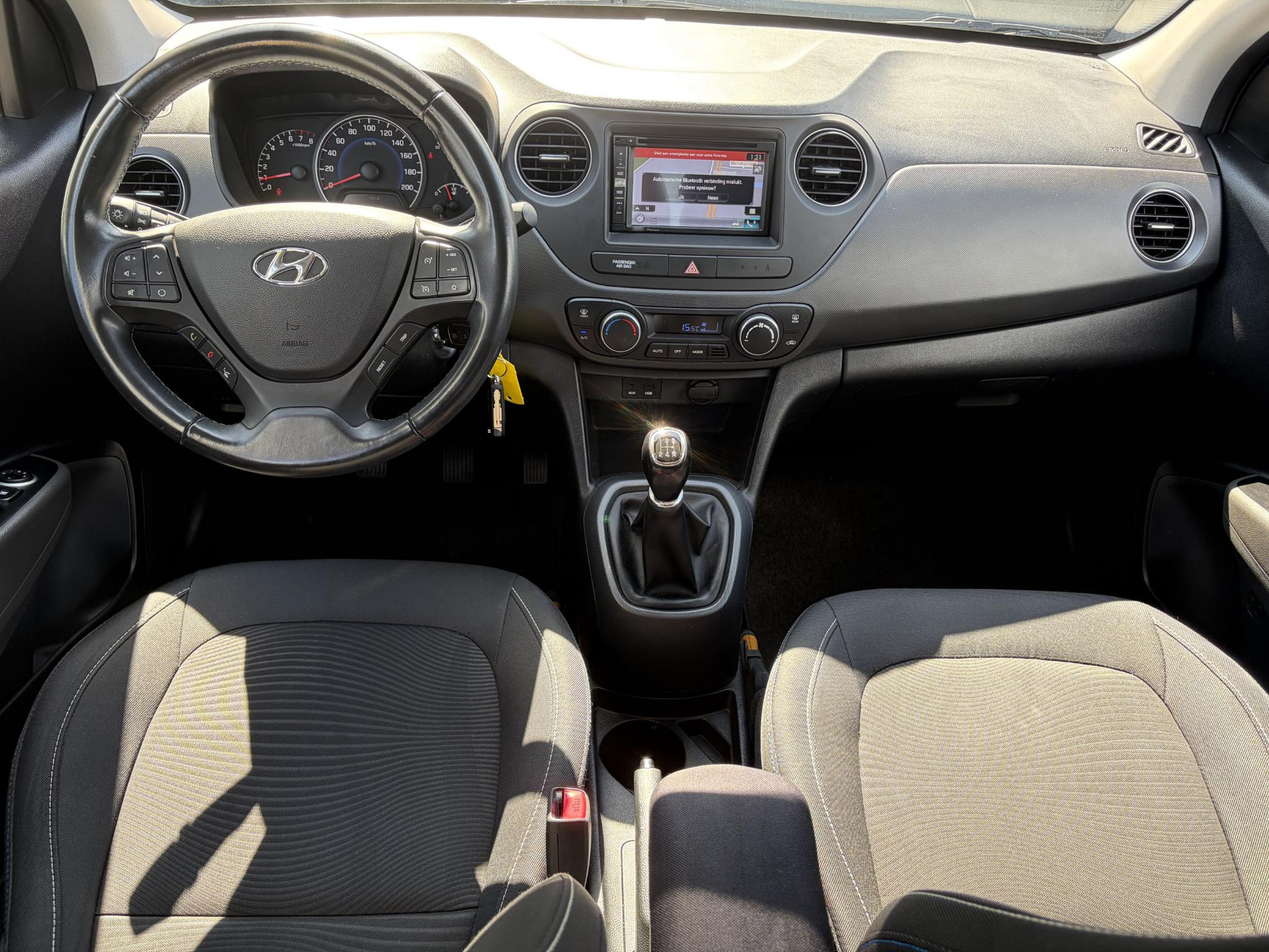 Hyundai i10 1.0i i-Motion Go! 2016 ✓Navi✓Clima✓Cruise✓Recent beurt gehad✓2eEigenaar✓5 Deurs✓N.A.P✓Weinig km✓Zeer Zuinig✓Apk tot 03-2027