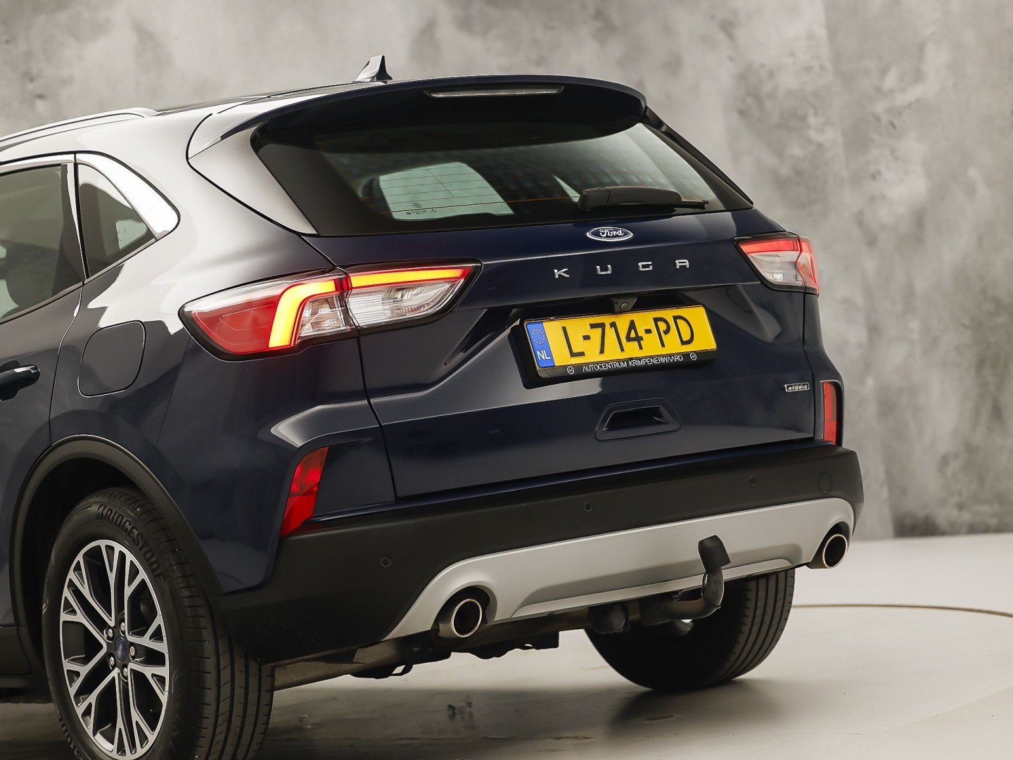 Ford Kuga 2.5 PHEV Titanium 225Pk Automaat (VIRTUAL COCKPIT, APPLE CARPLAY, GROOT NAVI, CAMERA, TREKHAAK, SPORTSTOELEN, KEYLESS, CRUISE, LANE ASSIST, NIEUWSTAAT)