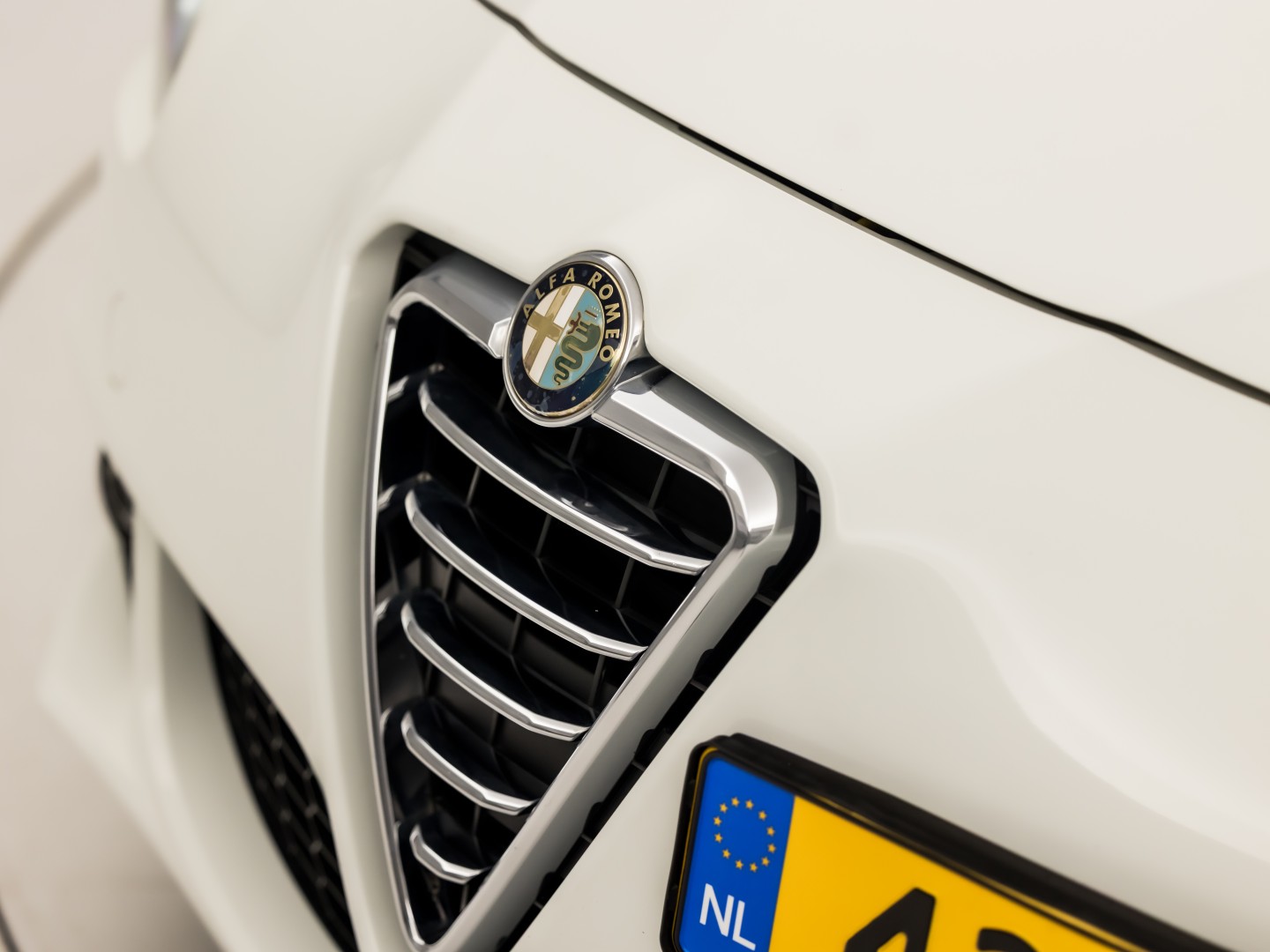 Alfa Romeo Giulietta 1.7 TBi Quadrifoglio Verde Sport 235Pk (APPLE CARPLAY, CLIMATE, GETINT GLAS, SPORTSTOELEN, LEDER, CRUISE, NIEUWSTAAT)