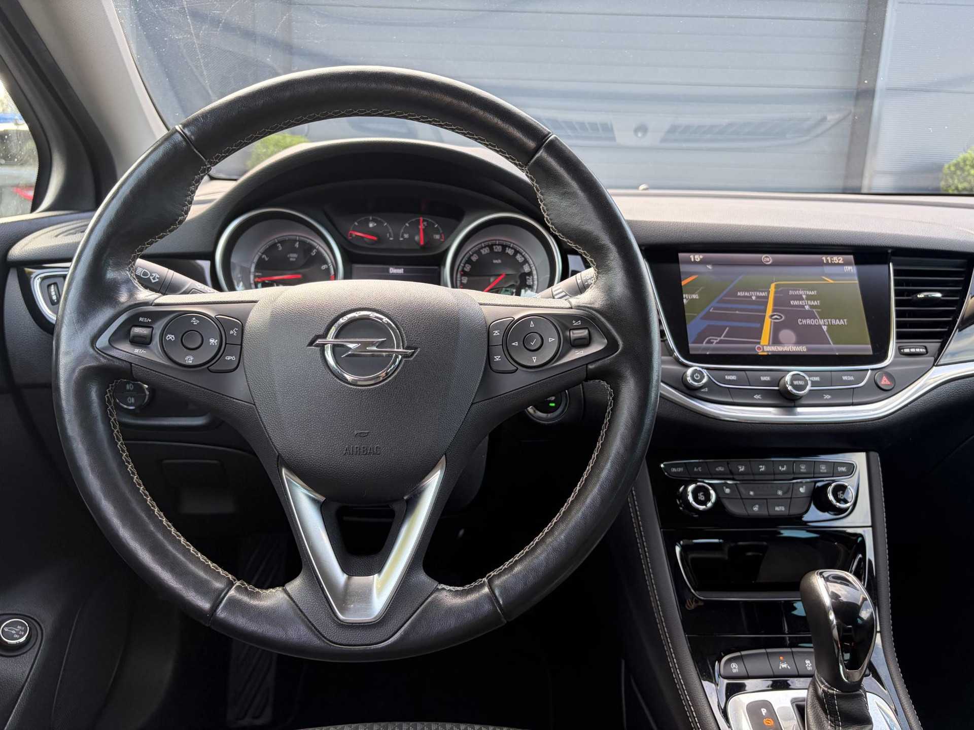 Opel Astra Sports Tourer 1.4 Business Executive ✓2 Eigenaar✓Camera✓Navi✓Trekhaakt✓Carplay✓Stoelverw✓Stuurverw✓Automaat✓Dealer Onderhouden✓Keyless✓Clima✓Cruise✓Pdc V+A✓Halfleder✓Comfortstoelen✓150pk✓Rijstrooksensor✓Dodehoeksensor✓Elekt Stoelen✓Lm velgen✓N.