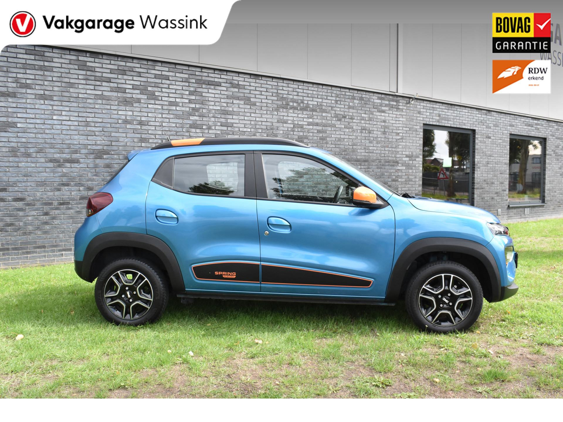 Dacia Spring Essential 27 kWh vol electric navigatie pdc Leer