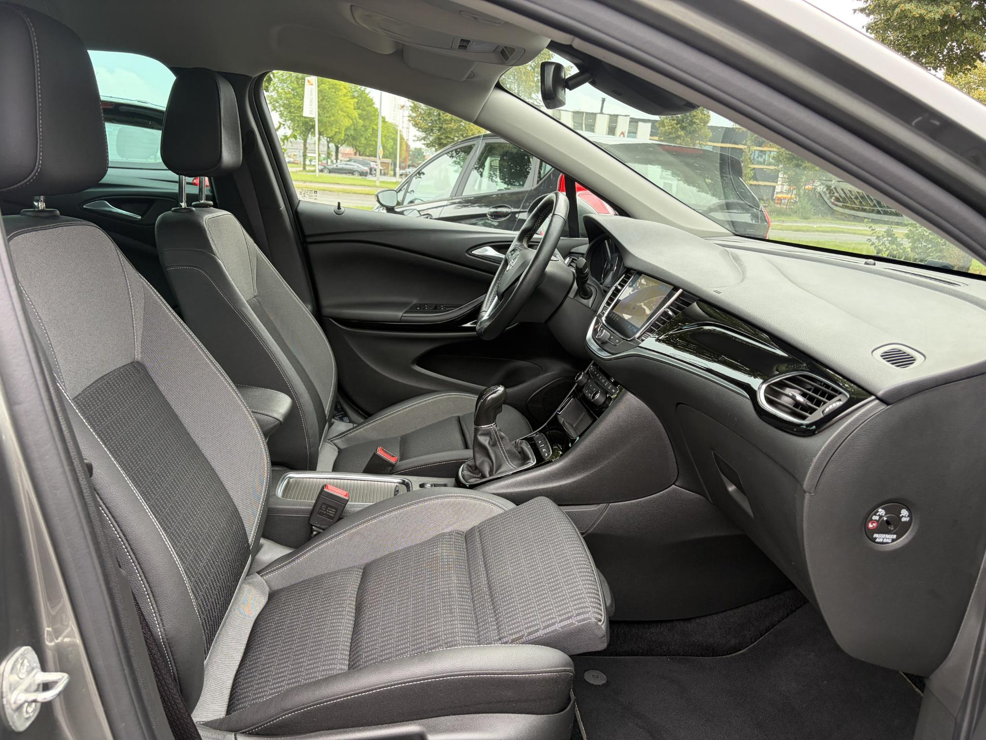 Opel Astra Sports Tourer 1.2 Elegance ✓131pk✓2e Eigenaar✓Camera✓Carplay✓6 Bak✓Stoelverw✓Stuurverw✓Pdc V+A✓Recent beurt gehad✓Clima✓Cruise✓Halfleder✓Keyless✓N.A.P✓Lm velgen✓Rijstrooksensor✓Apk tot 09-2028