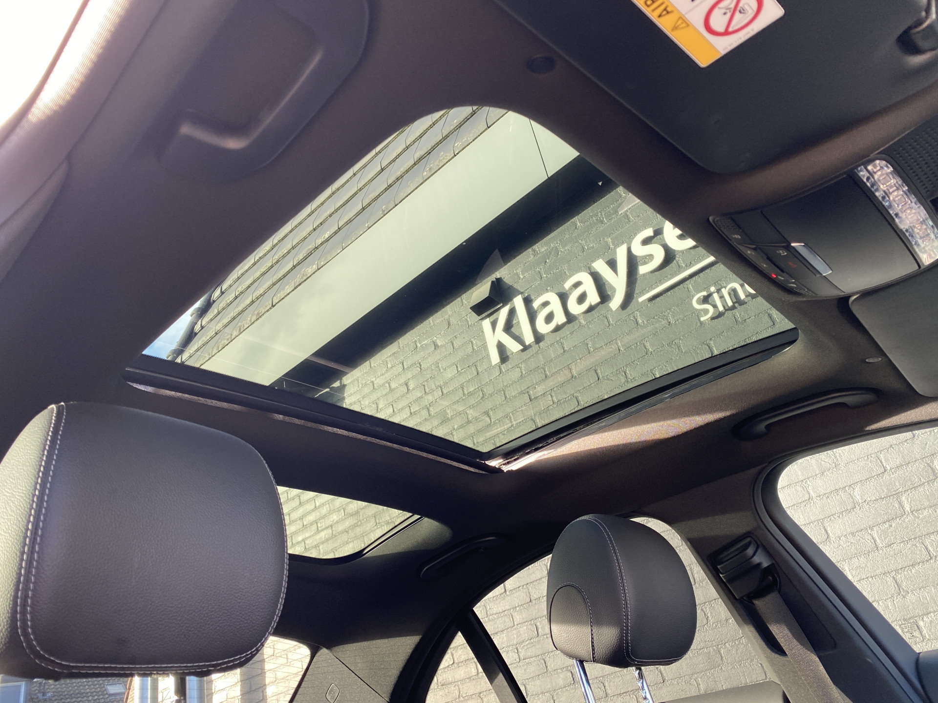 Mercedes-Benz C-klasse 180 Business Solution AMG AUT. | dealer onderhouden | panoramadak | night pakket | navigatie | NL auto