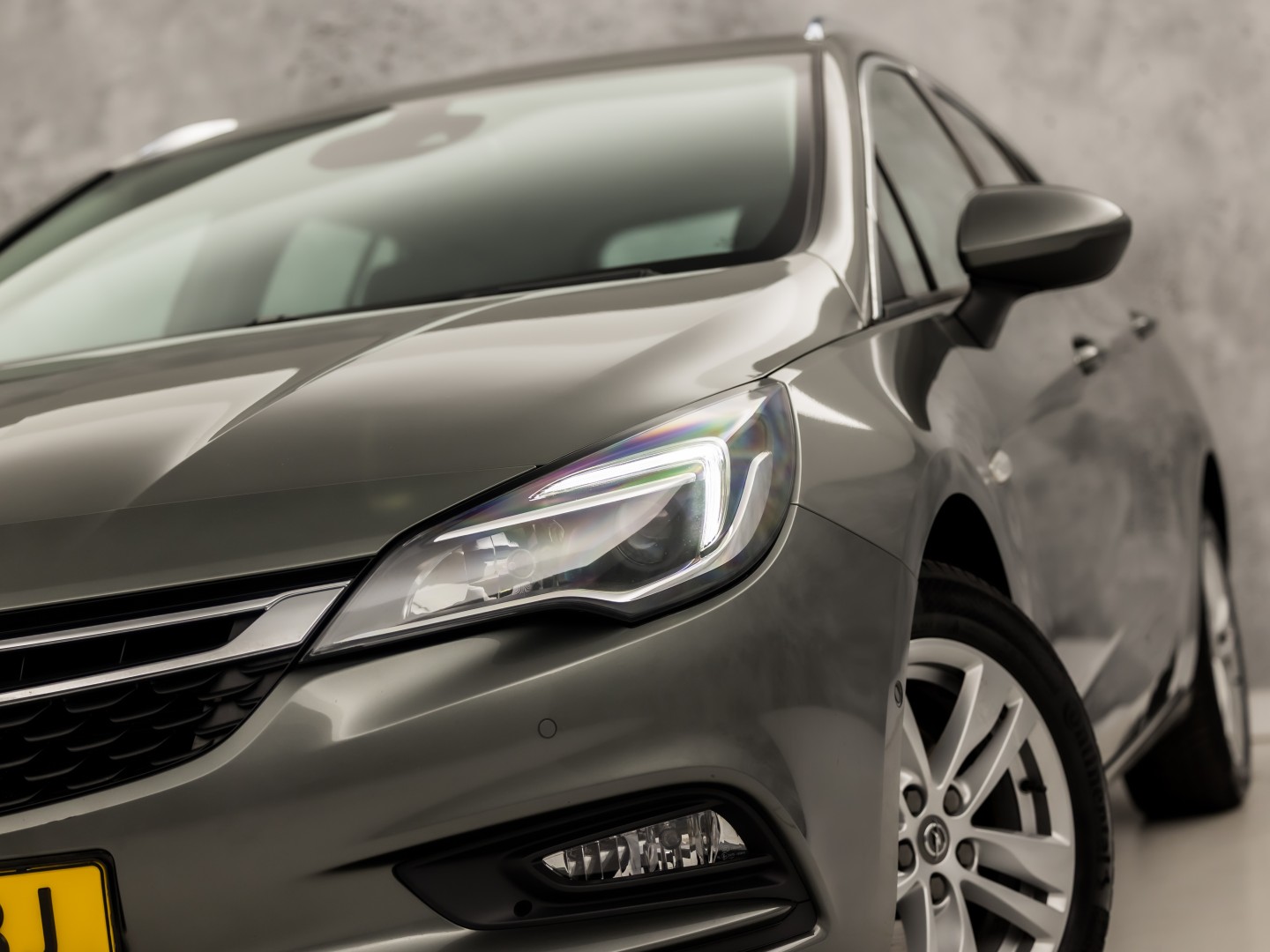 Opel Astra Sports Tourer 1.4 Turbo Innovation Sport 150Pk Automaat (APPLE CARPLAY, NAVIGATIE, CAMERA, STUUR/STOELVERWARMING, SPORTSTOELEN, ADAPTIVE CRUISE, LM VELGEN, NIEUWSTAAT)