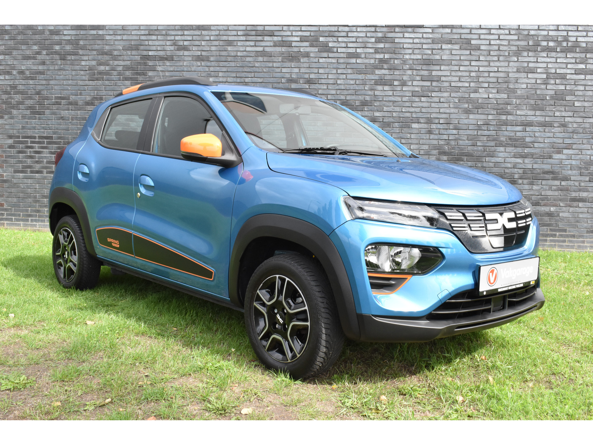 Dacia Spring Essential 27 kWh vol electric navigatie pdc Leer