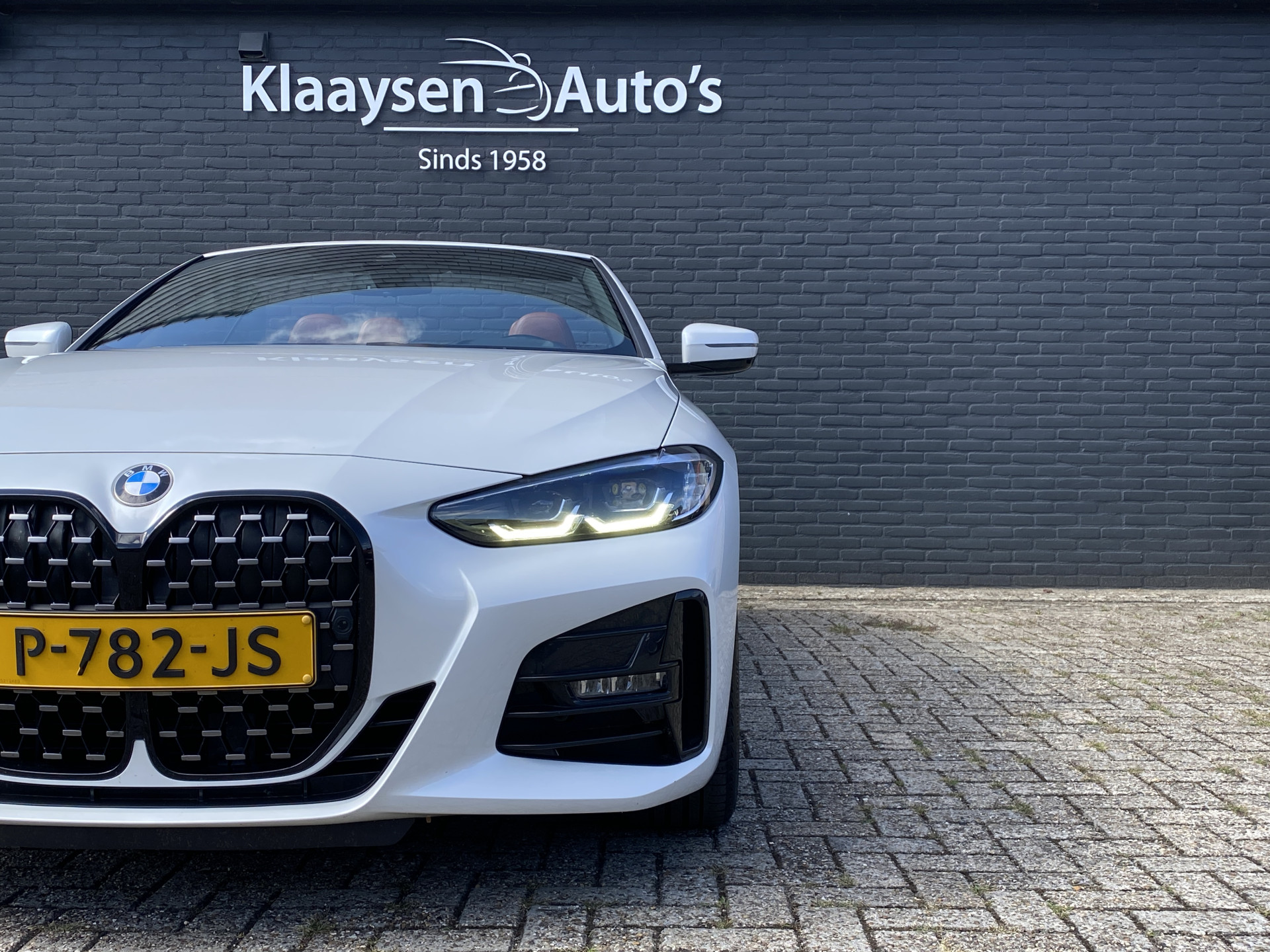 BMW 4-serie Cabrio 420i M-Sport 184 pk High Executive AUT. | dealer onderh. | cognac leder | memory seat | trekhaak | stoel-/stuurverw.
