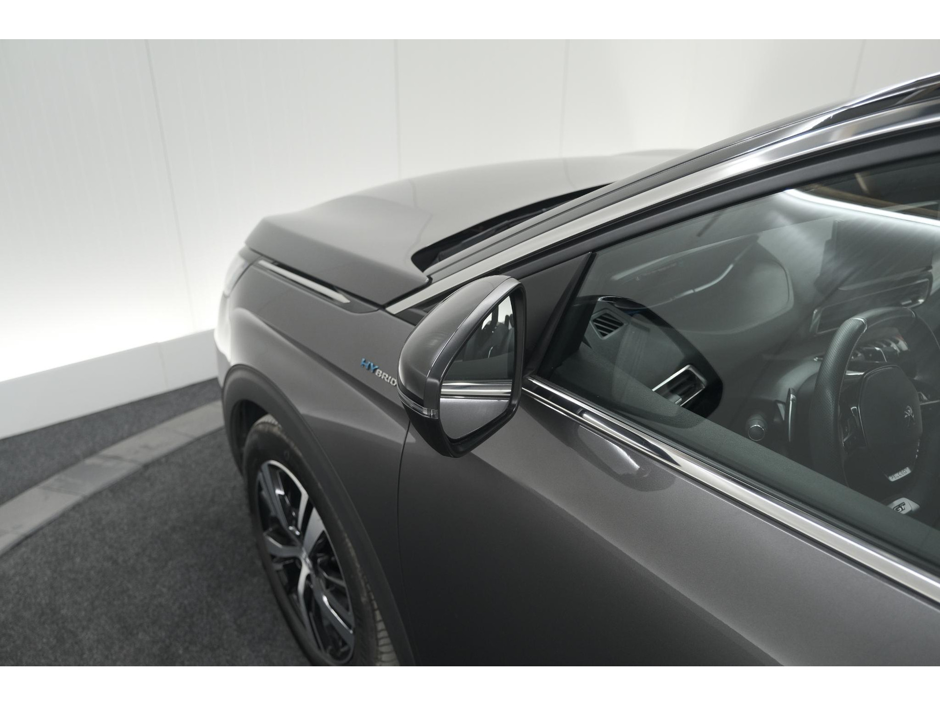 Peugeot 3008 HYbrid4 300 GT | Elektrisch Panoramadak | Dodehoekdetectie | Camera | Navigatie