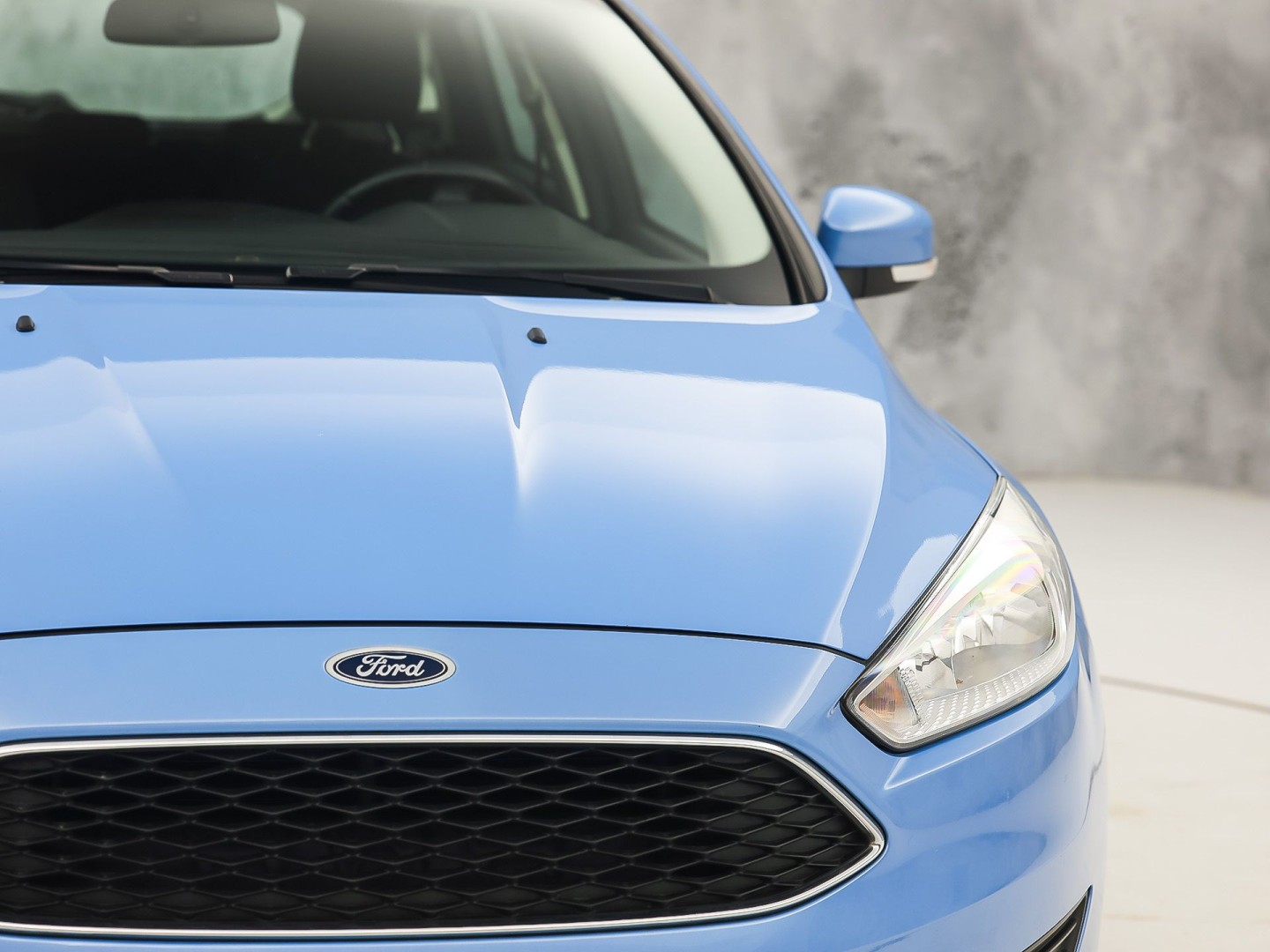 Ford Focus 1.0 Sport (NAVIGATIE, LM VELGEN, PARKEERSENSOREN, TREKHAAK, SPORTSTOELEN, CRUISE, NIEUWSTAAT)