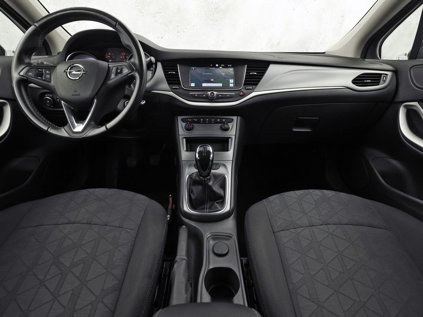 Opel Astra Sports Tourer 1.0 Turbo 120 Jaar Edition (APPLE CARPLAY, NAVIGATIE, LM VELGEN, PARKEERSENSOREN, SPORTSTOELEN, CRUISE, NIEUWE APK, NIEUWSTAAT)