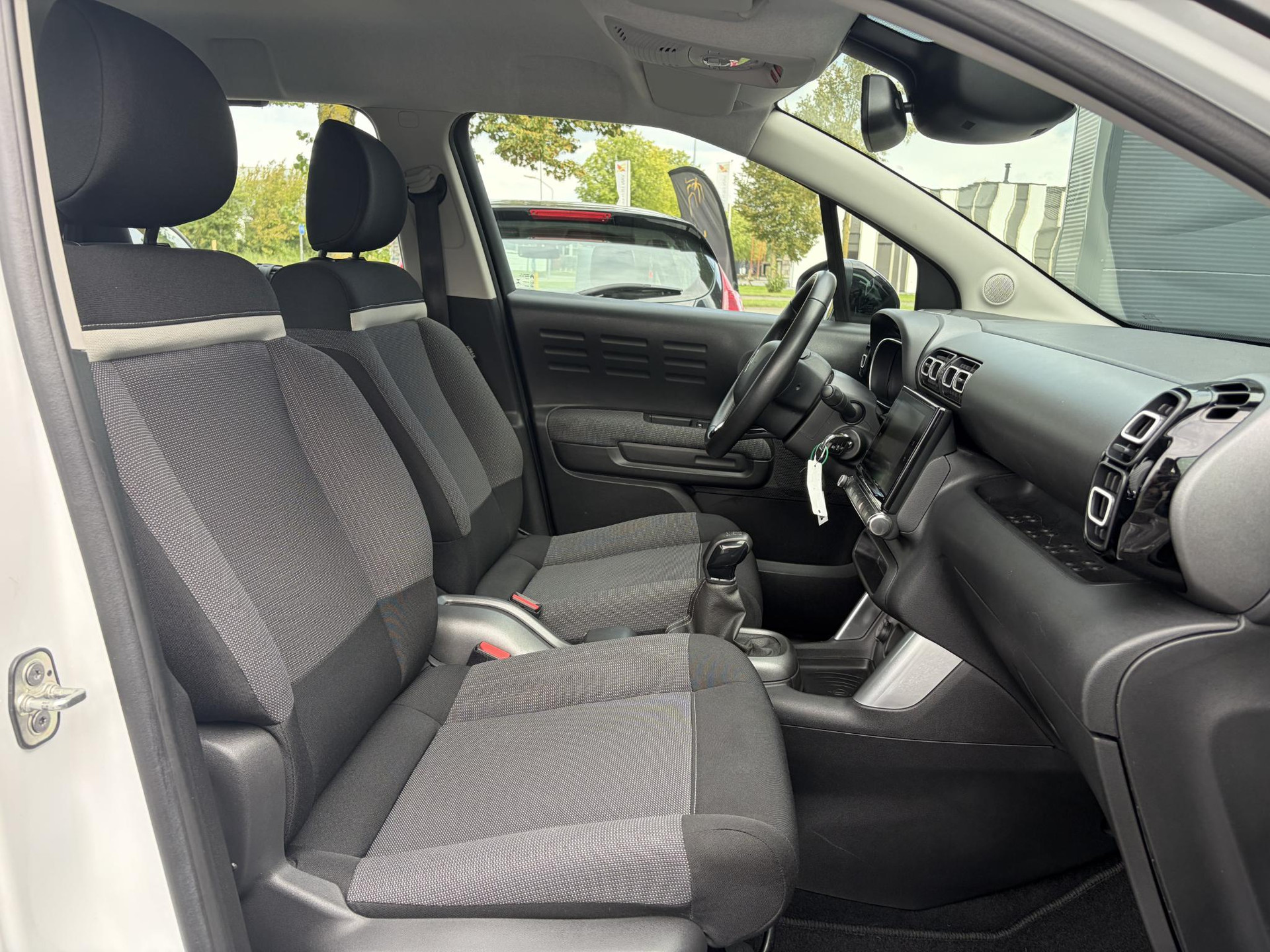Citroen C3 Aircross 1.2 PureTech Feel ✓1e Eigenaar✓D-riem vv in 08-2026✓Draadloze telefoonlader✓Carplay✓Navi✓Clima✓Cruise✓Pdc✓Rijstrooksensor✓Bj 10-2018✓Lm velgen✓N.A.P✓Apk tot 11-2027