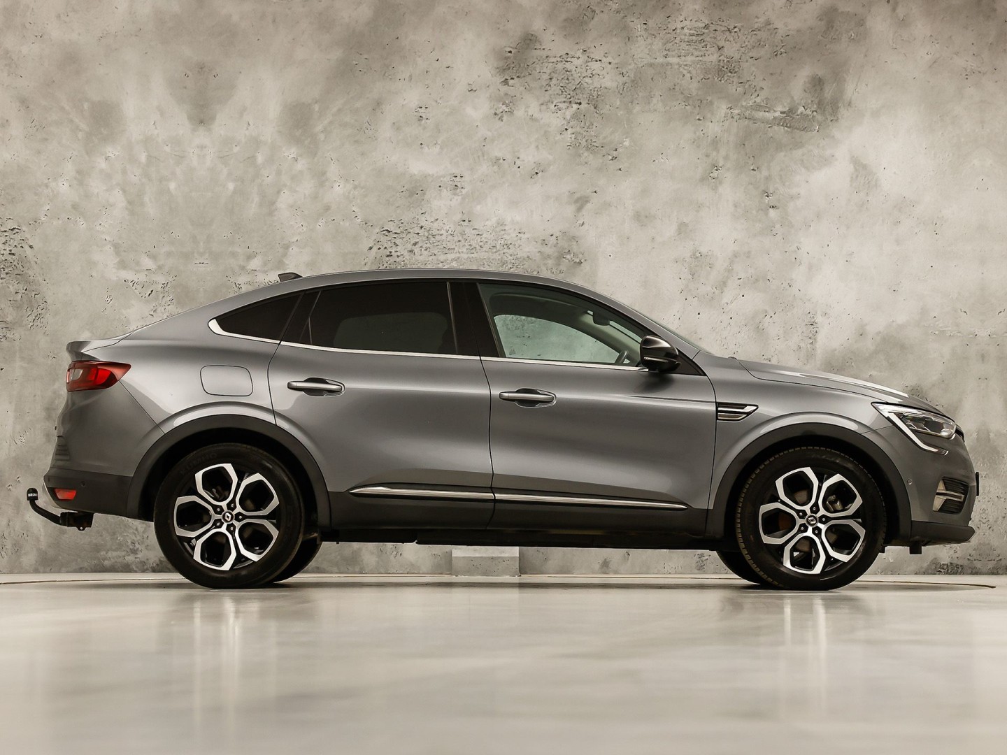 Renault Arkana 1.6 E-Tech Hybrid 145 Intens 145Pk Automaat (GROOT NAVI, CAMERA, STOELVERWARMING, SPORTSTOELEN, ADAPTIVE CRUISE, GETINT GLAS, KEYLESS, NIEUWSTAAT)