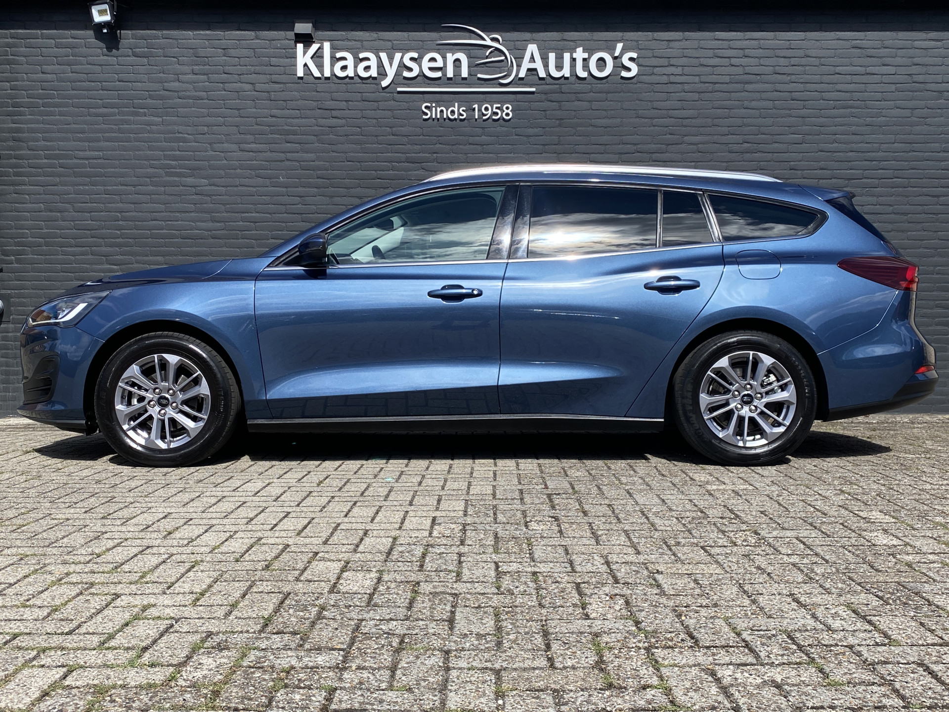 Ford Focus Wagon 1.0 EcoBoost Hybrid 155 pk Titanium AUT. | 1e eigenaar | dealer onderh. | navigatie | cruise control | BTW auto