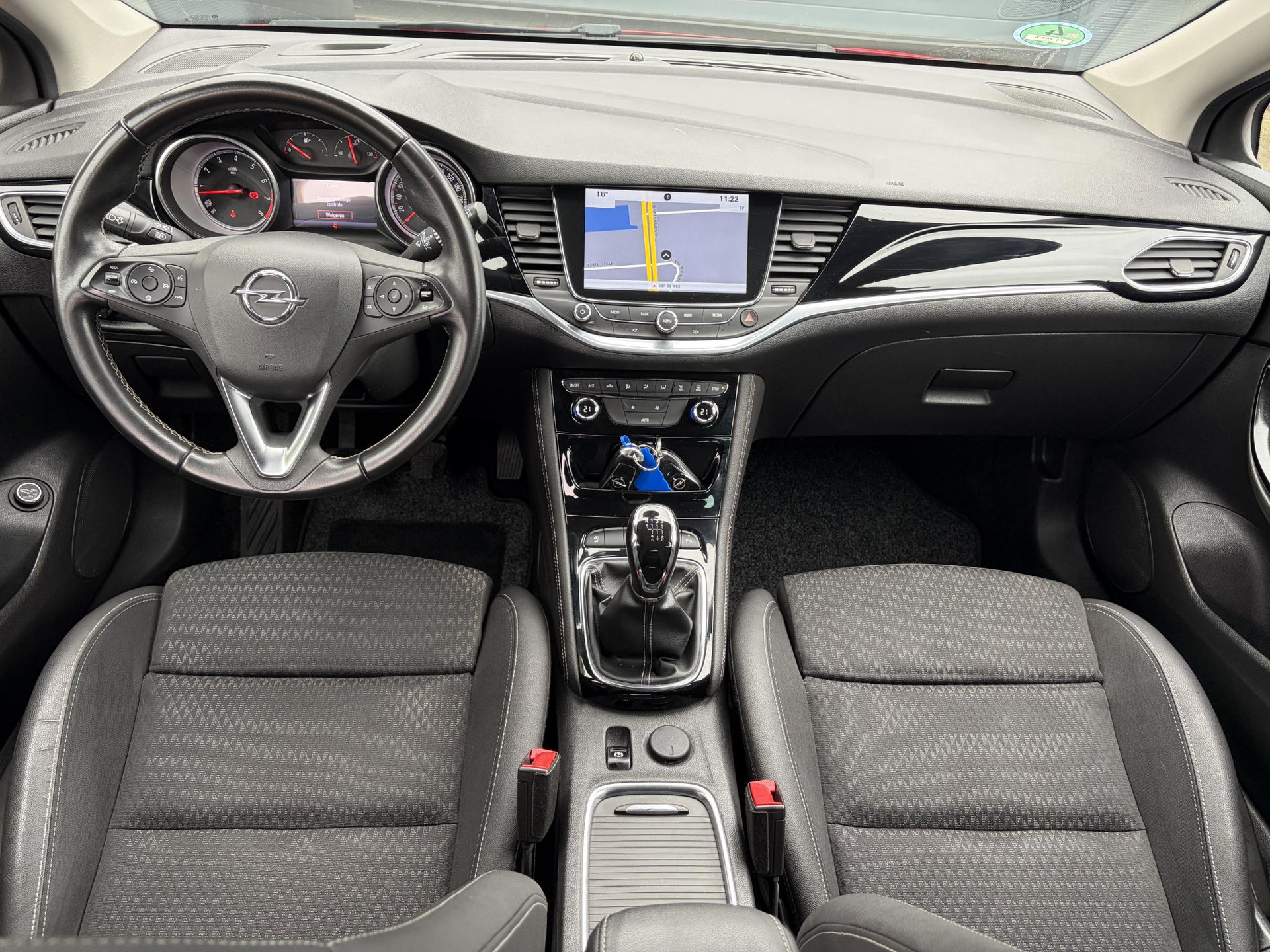 Opel Astra Sports Tourer 1.4 Innovation Dealer Onderhouden l 150pk l Carplay l 2e Eigenaar l Camera l Trekhaak l Keyless l Navi l Halfleder l Pdc V+A l 6 Bak l Clima l Cruise l Rijstrooksensor l Dodehoeksensor l N.A.P l Apk tot 01-2027