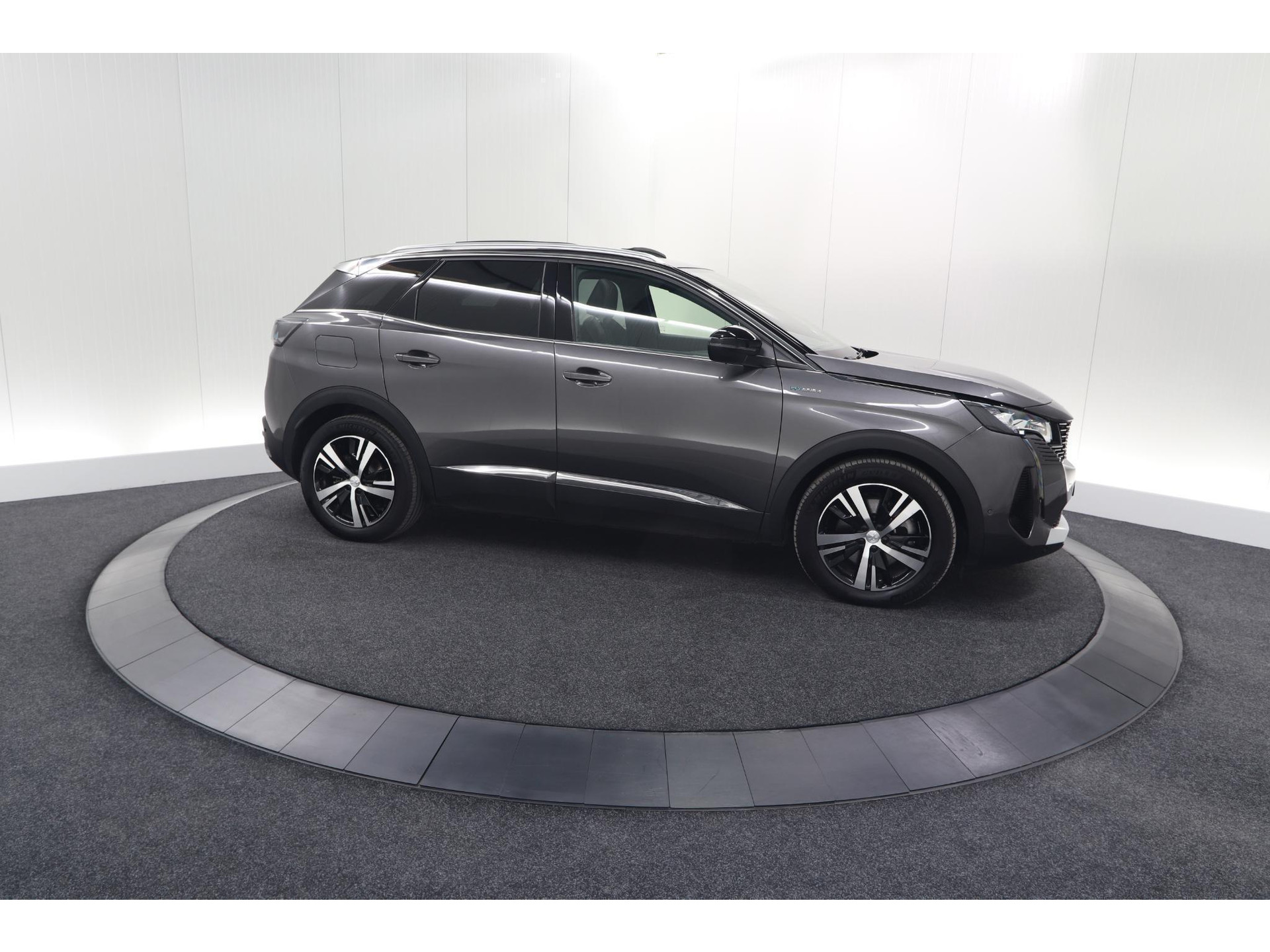 Peugeot 3008 HYbrid4 300 GT | Elektrisch Panoramadak | Dodehoekdetectie | Camera | Navigatie