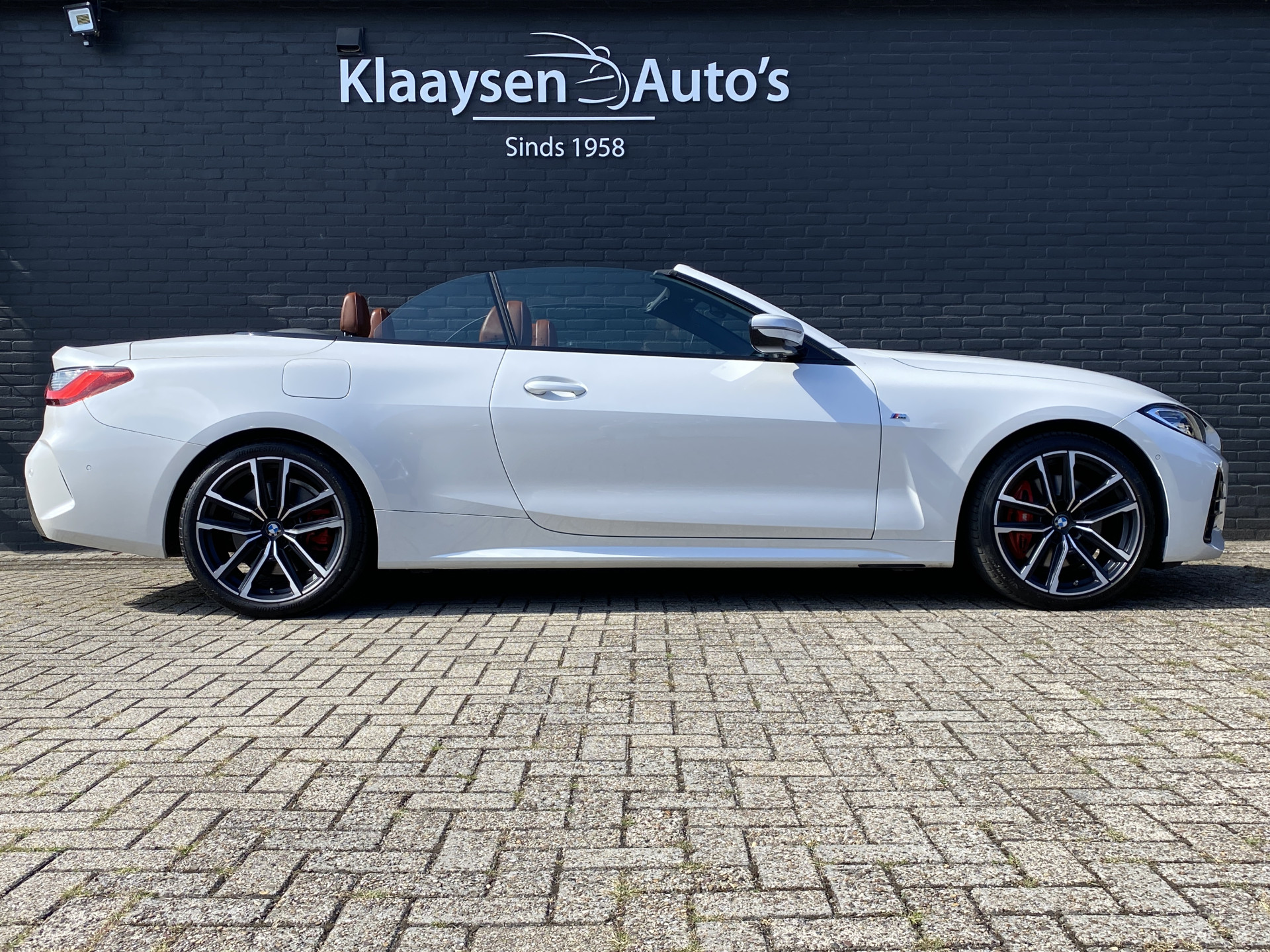 BMW 4-serie Cabrio 420i M-Sport 184 pk High Executive AUT. | dealer onderh. | cognac leder | memory seat | trekhaak | stoel-/stuurverw.