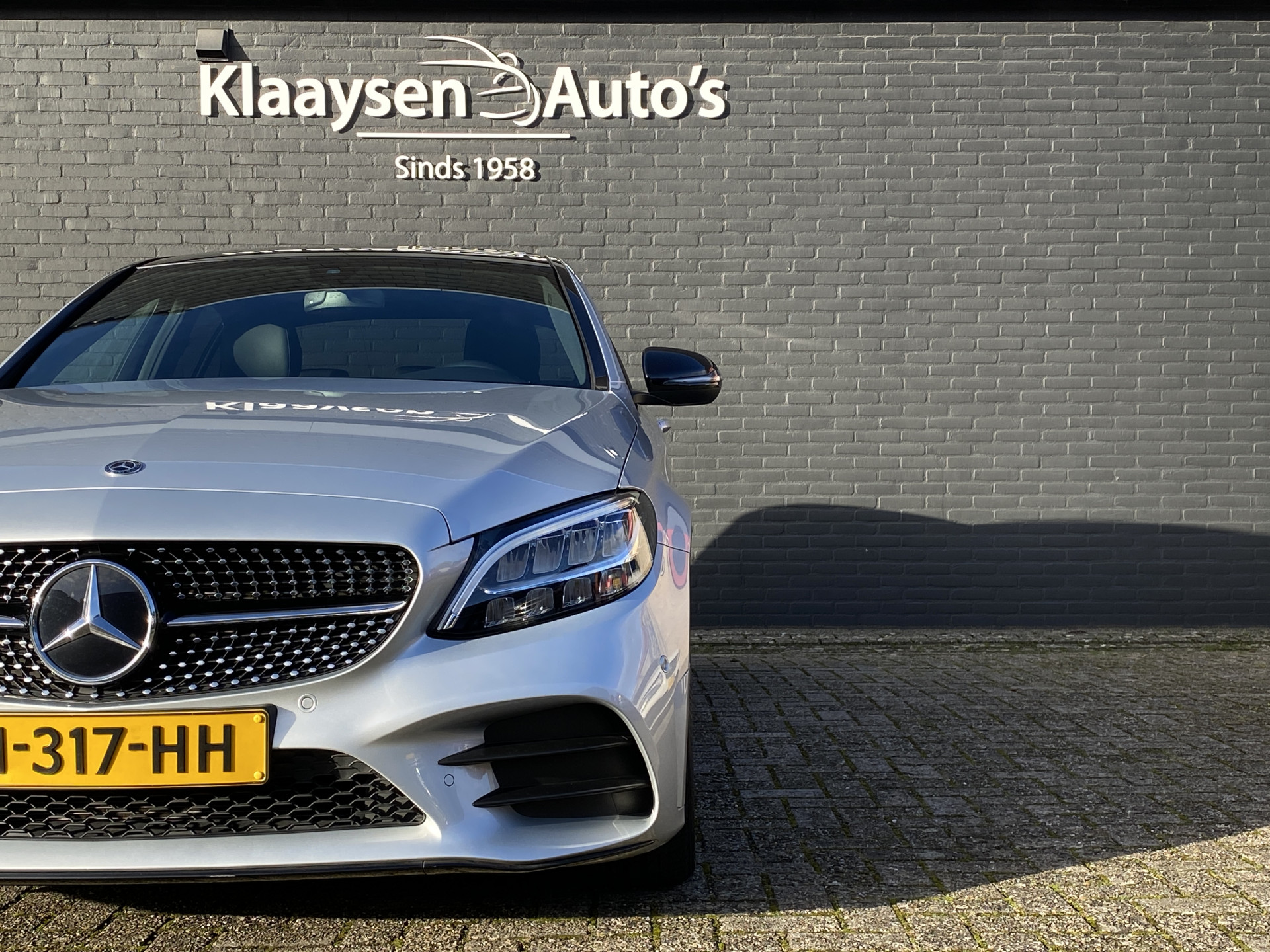 Mercedes-Benz C-klasse 180 Business Solution AMG AUT. | dealer onderhouden | panoramadak | night pakket | navigatie | NL auto