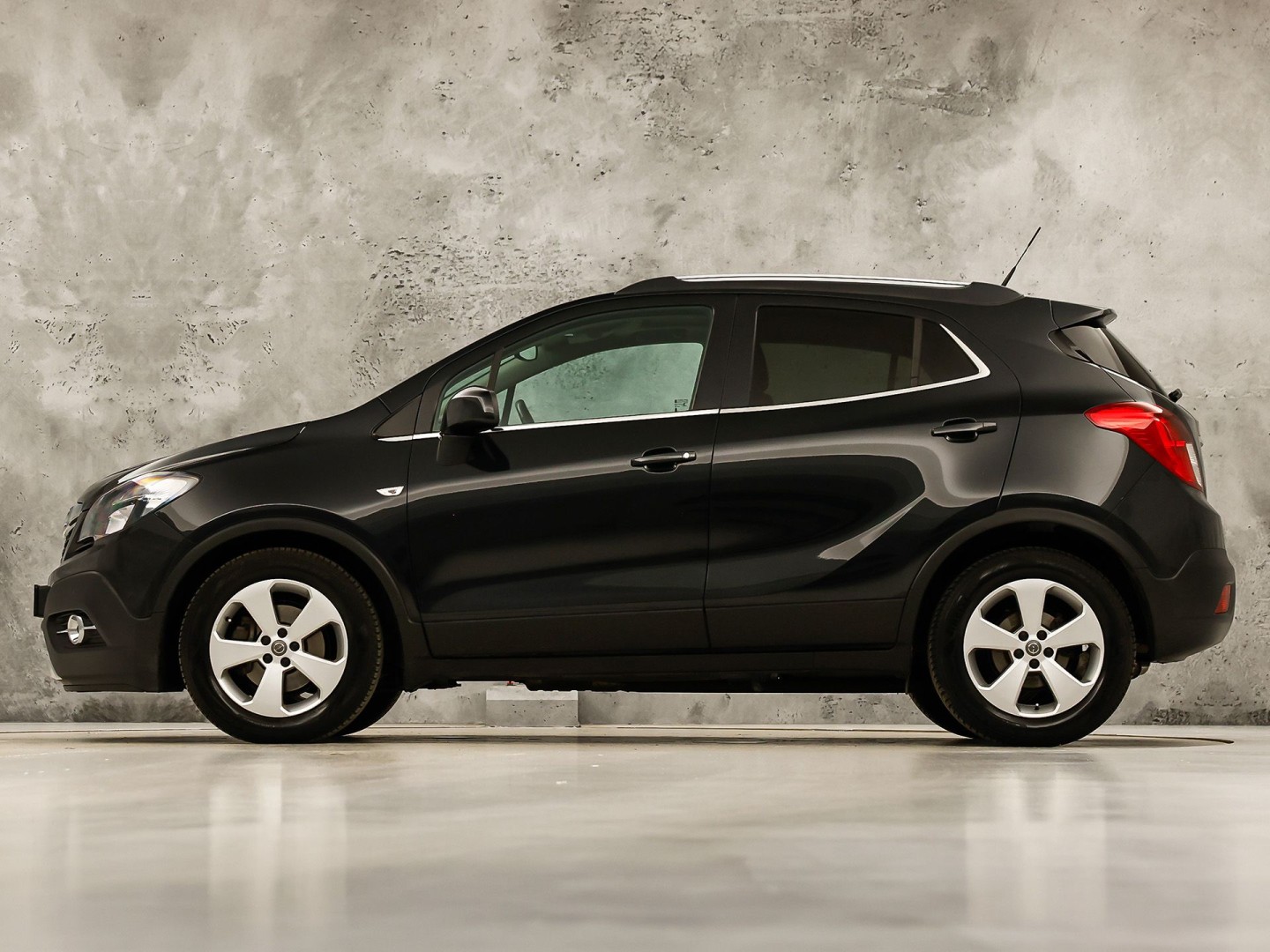Opel Mokka 1.4 T Cosmo Sport 140Pk (SCHUIFDAK, NAVIGATIE, CLIMATE, STUUR/STOELVERWARMING, SPORTSTOELEN, GETINT GLAS, CAMERA, NIEUWSTAAT)