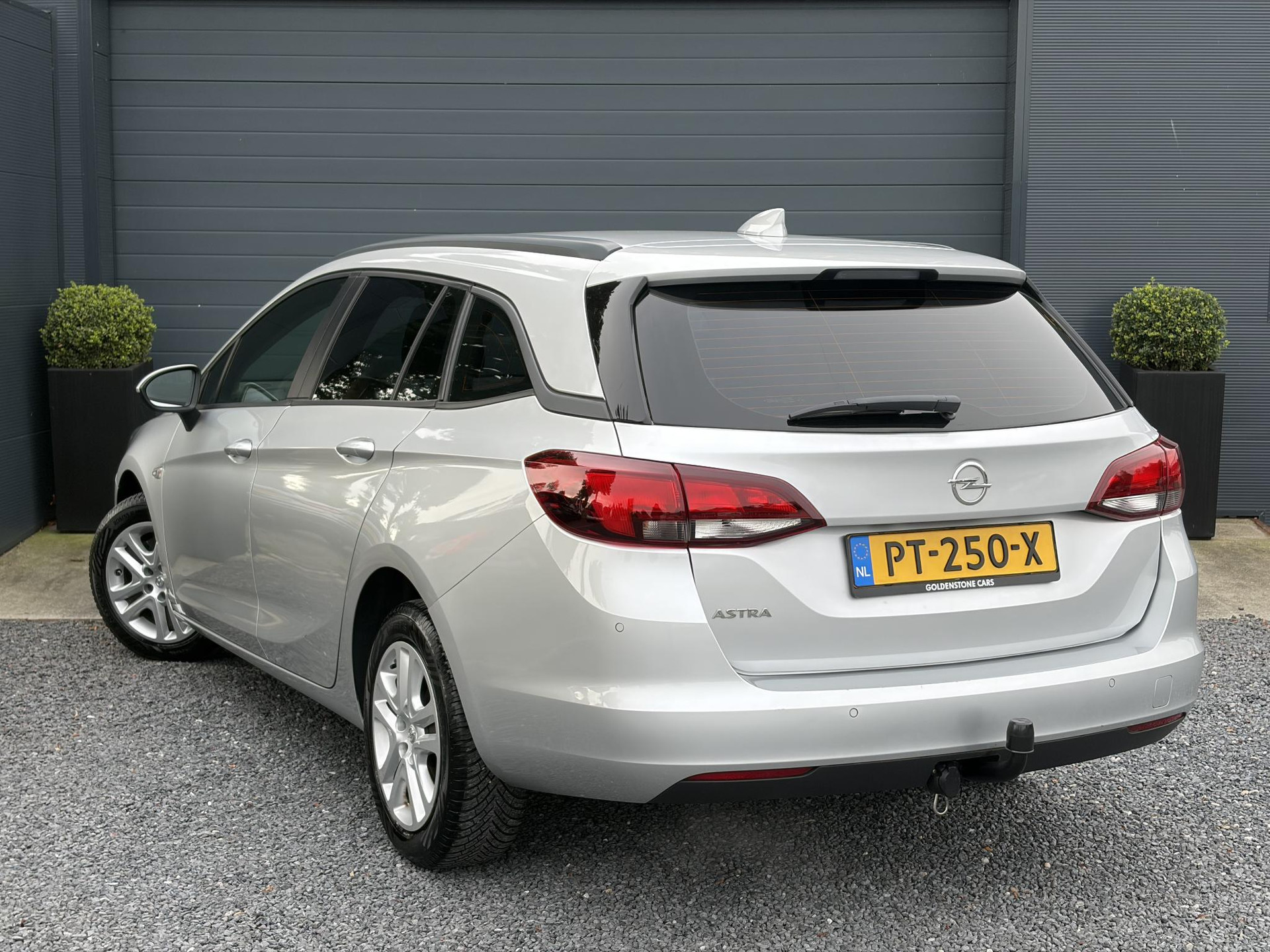 Opel Astra Sports Tourer 1.0 Online Edition ✓2e Eigenaar✓Carplay✓Navi✓Trekhaak✓Net beurt gehad✓Clima✓Cruise✓Pdc V+A✓105pk✓N.A.P✓Lm velgen✓Apk tot 10-2027