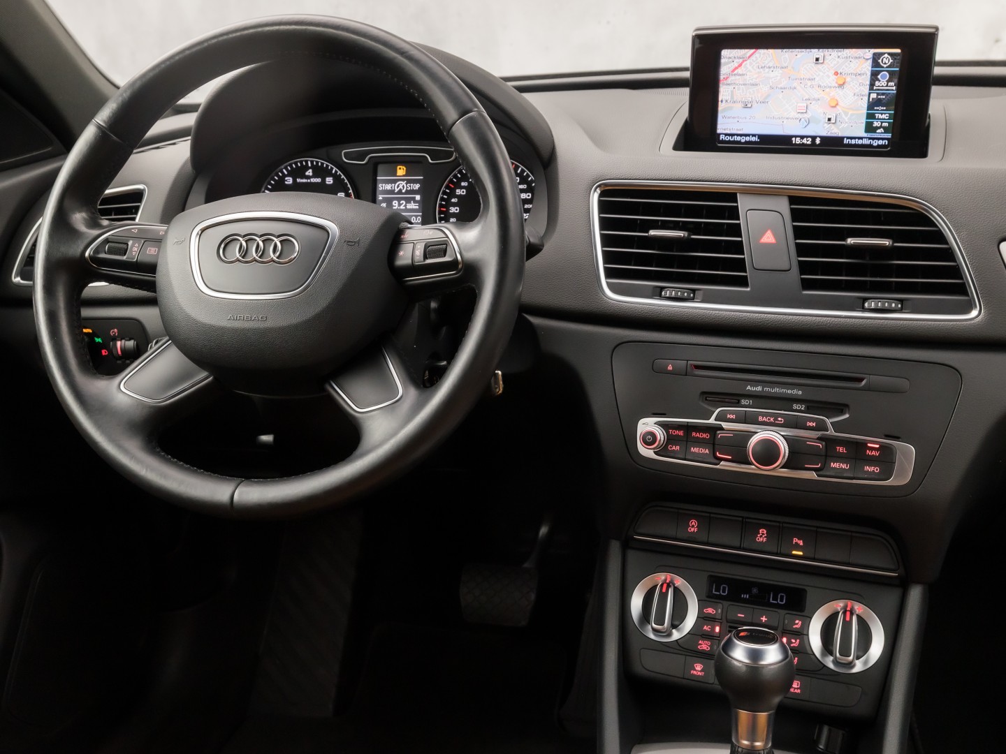 Audi Q3 2.0 TFSI Quattro Sport 211Pk Automaat (NAVIGATIE, CLIMATE, ZWART HEMEL, BRUIN LEDER, SPORTSTOELEN, CRUISE, PARKEERSENSOREN, XENON, NIEUWSTAAT)