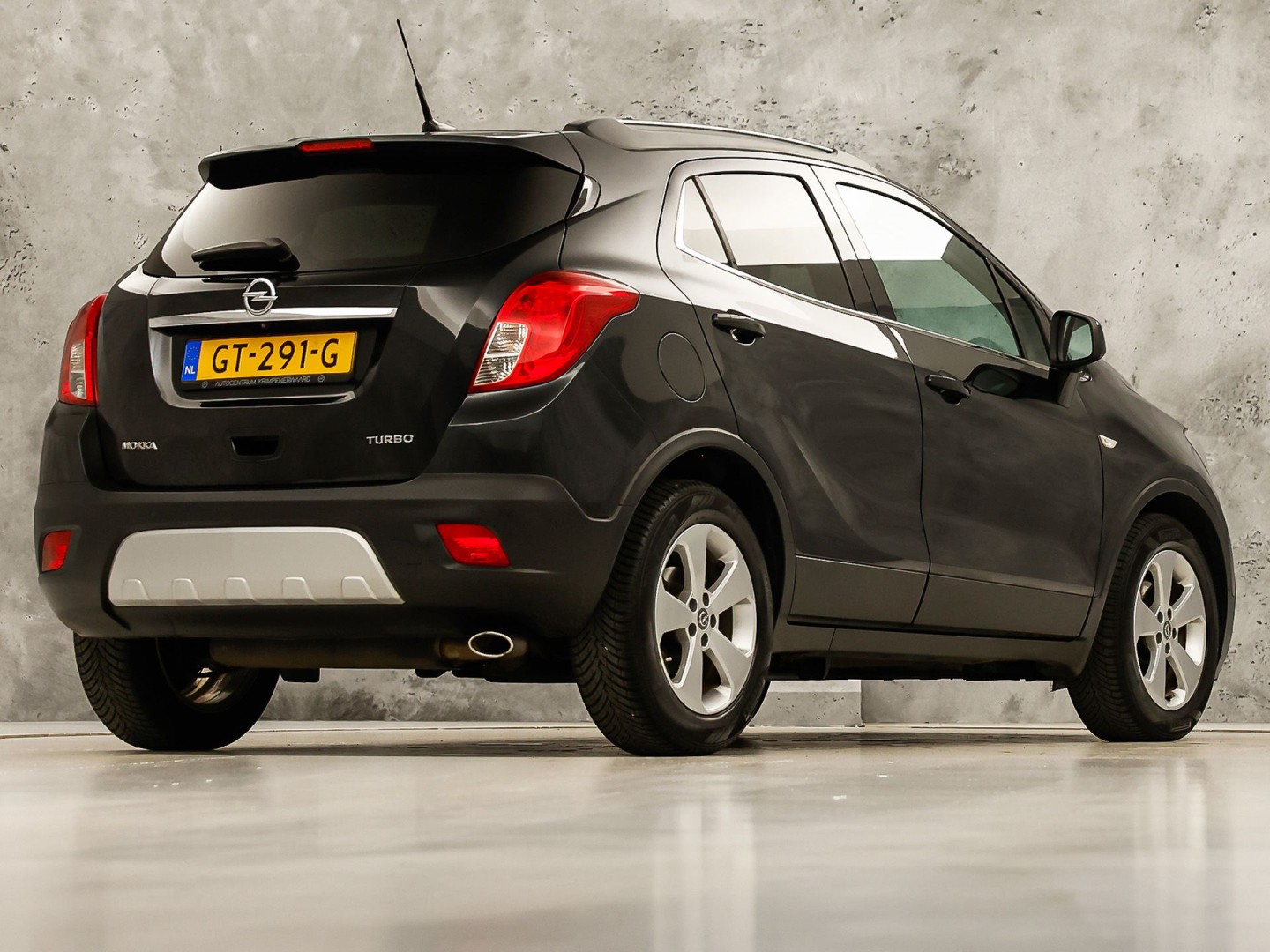 Opel Mokka 1.4 T Cosmo Sport 140Pk (SCHUIFDAK, NAVIGATIE, CLIMATE, STUUR/STOELVERWARMING, SPORTSTOELEN, GETINT GLAS, CAMERA, NIEUWSTAAT)