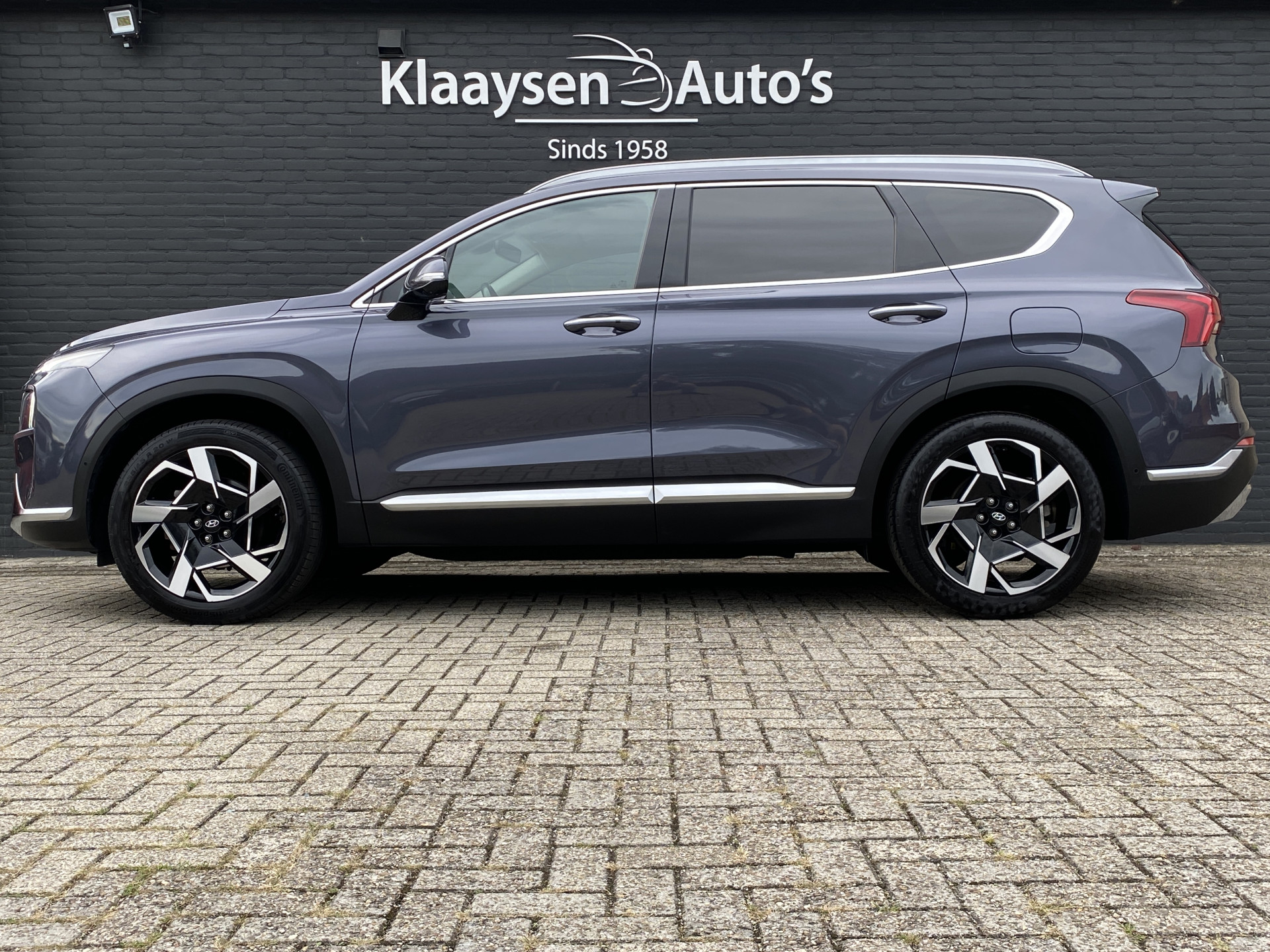 Hyundai Santa Fe 1.6 T-GDI HEV 230 pk Premium AUT. | dealer onderh. | leder inter. | 360 camera | trekhaak | memory | stoel-/stuurvw.