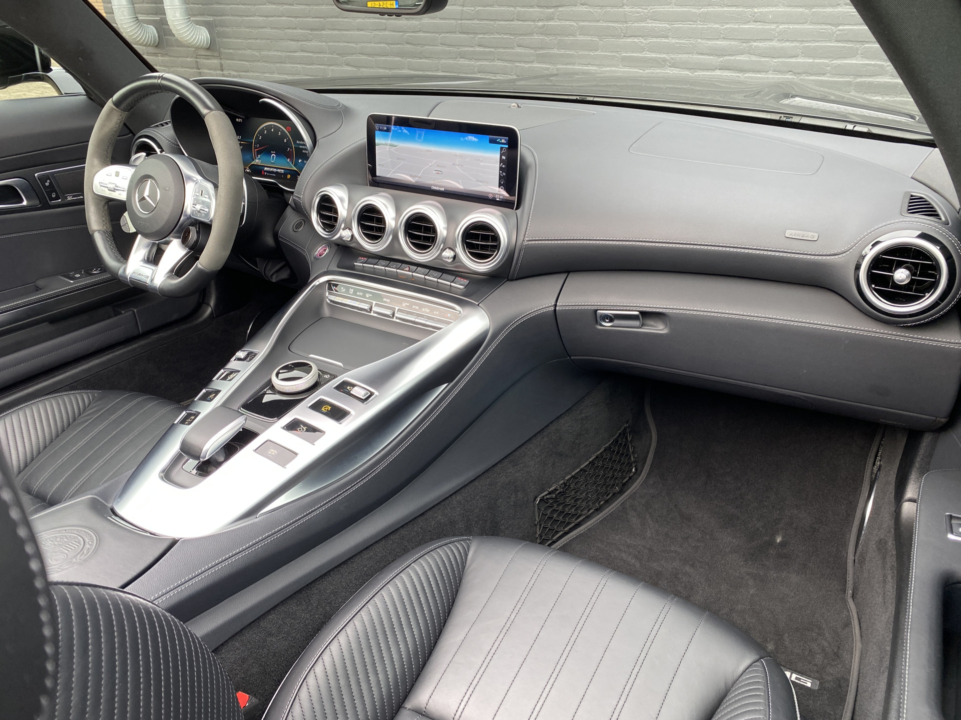 Mercedes-Benz AMG GT C Roadster 4.0 Premium V8 577 pk AUT. | dealer onderhouden | achteras besturing | memory stoel | adaptieve cruise | 360 camera