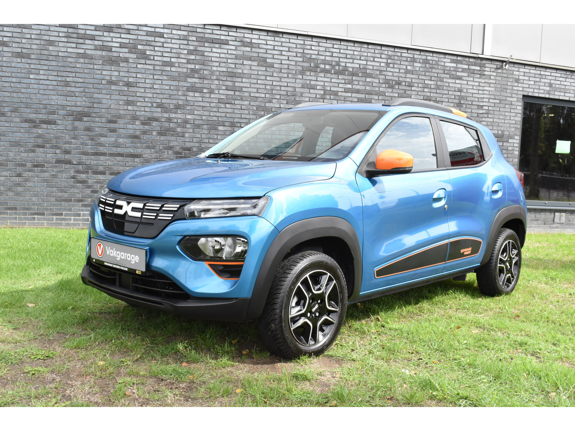 Dacia Spring Essential 27 kWh vol electric navigatie pdc Leer