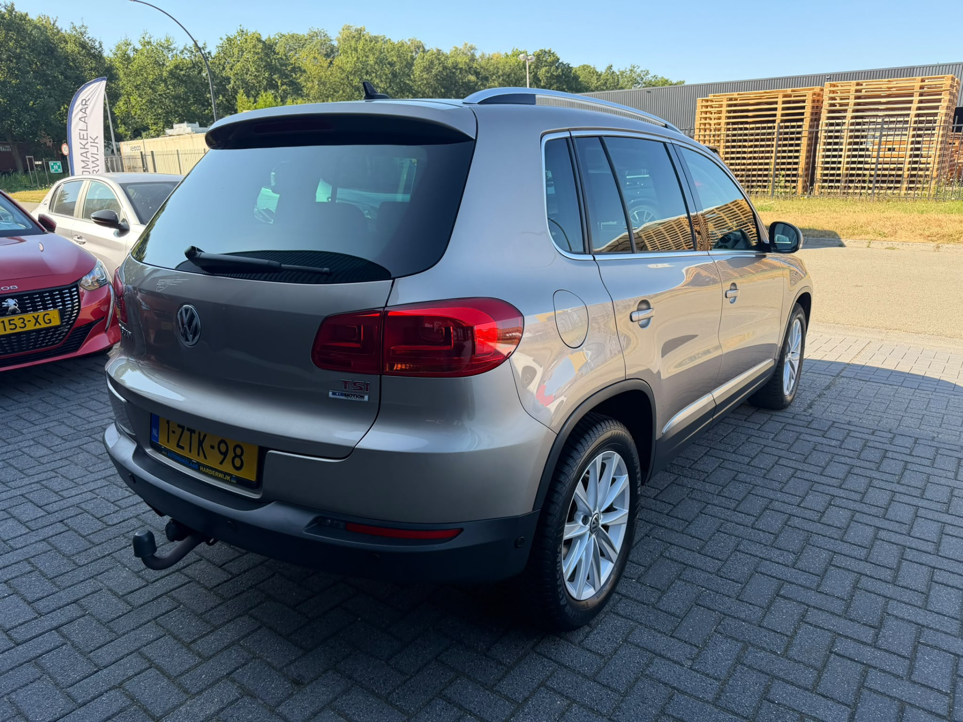 Volkswagen Tiguan 1.4 TSI Sport&Style | 1E EIGENAAR |3/6/12 MND GARANTIE | NAVI | PDC | TREKHAAK | NL AUTO |