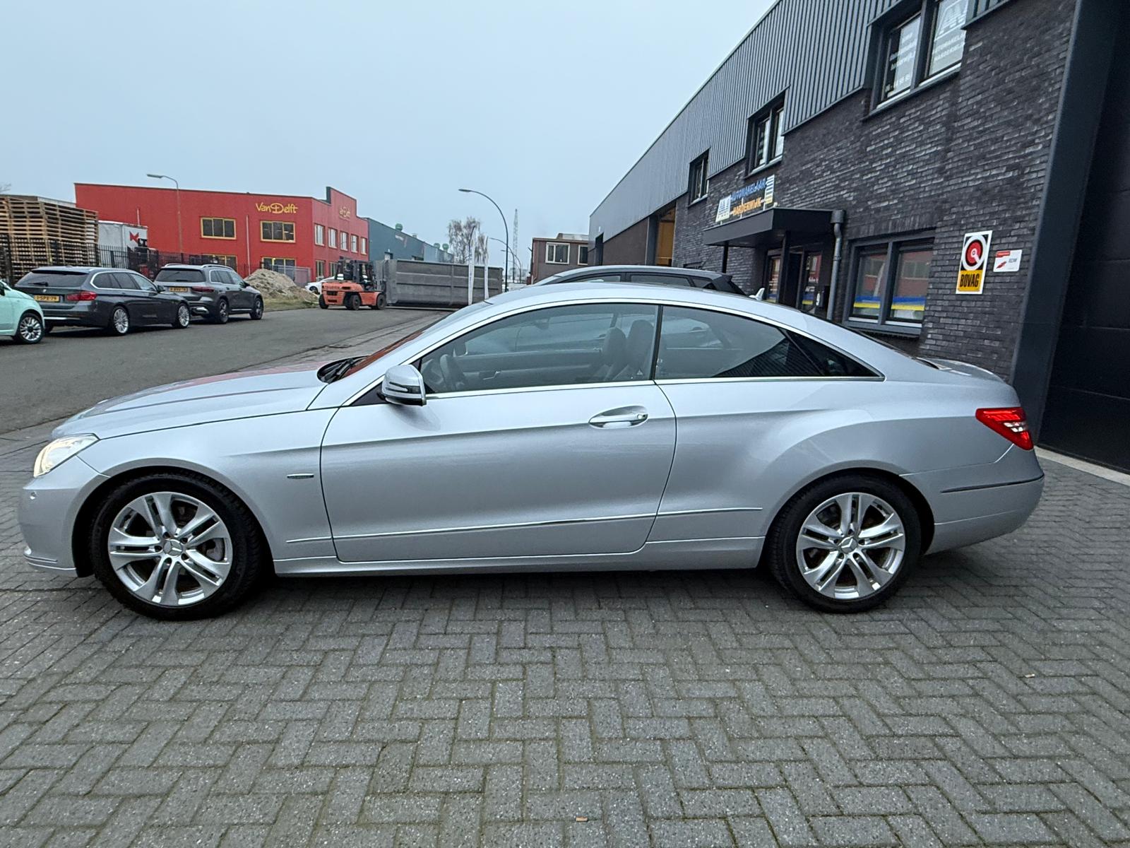 Mercedes-Benz E-klasse Coupé 200 CGI Avantgarde | 2E EIGENAAR | 3/6/12MND GARANTIE | LEDER | NAVI | CRUISE | LMV |