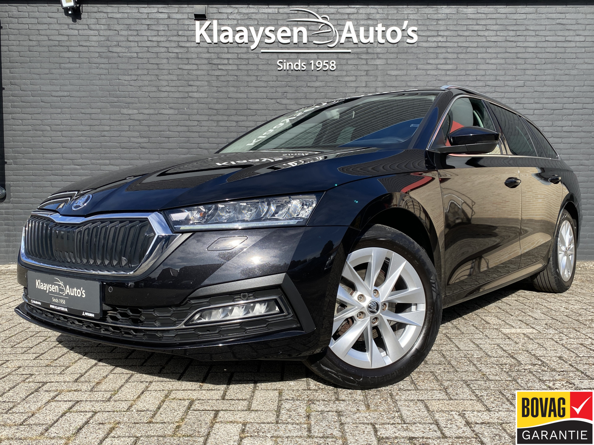 ŠKODA Octavia Combi 1.0 e-TSI Business Edition Plus AUT. | 1e eigenaar | dealer onderh. | navigatie | trekhaak | carplay | adaptieve cruise