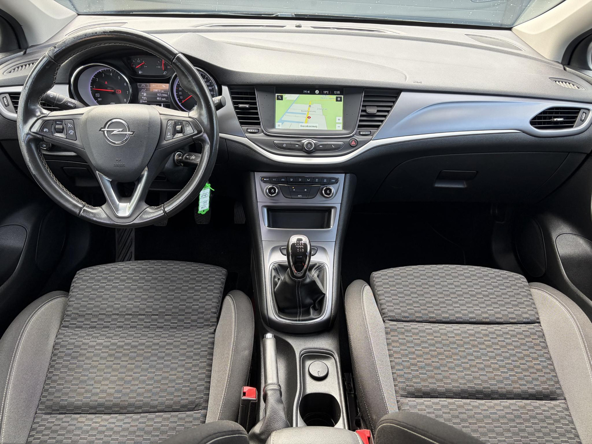 Opel Astra 1.2 Business Edition 147pk l 2e Eigenaar l Trekhaak l Navi l Carplay l 6 Bak l Clima l Cruise l Pdc V+A l Recent beurt gehad l Lm velgen l N.A.P l Apk tot 07-2028