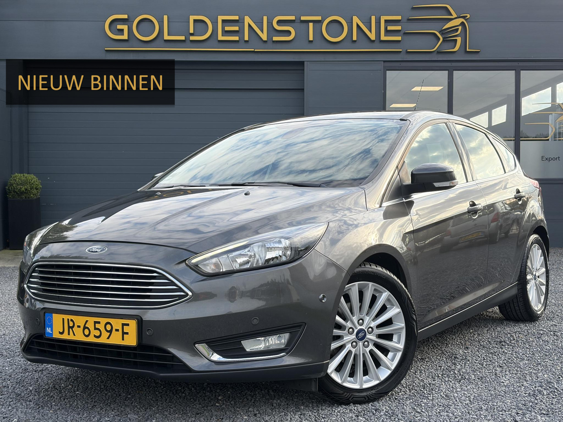 Ford Focus 1.0 Titanium   ✓125pk✓2e Eigenaar✓Navi✓Trekhaak✓6 Bak✓Clima✓Cruise✓Pdc V+A✓Net Beurt gehad✓17''Lm velgen✓N.A.P✓N.A.P✓Apk tot 09-2027