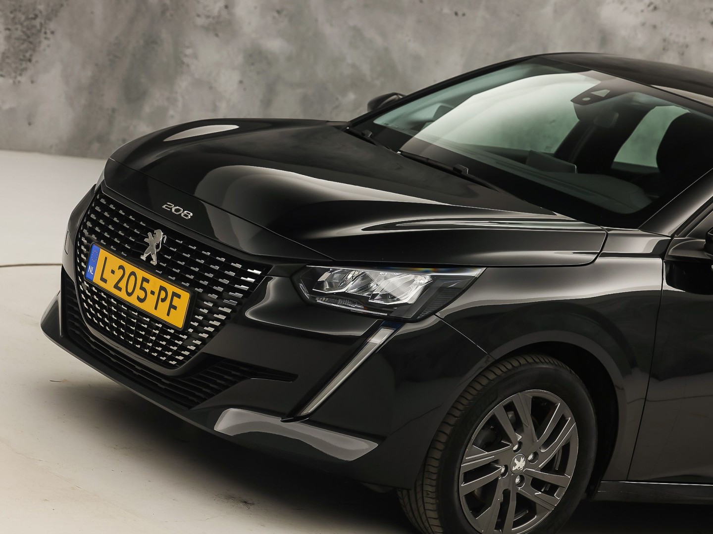 Peugeot 208 1.2 PureTech Sport Automaat (APPLE CARPLAY, KEYLESS, PARKEERSENSOREN, SPORTSTOELEN, CRUISE, LANE ASSIST, NIEUWE APK, NIEUWSTAAT)