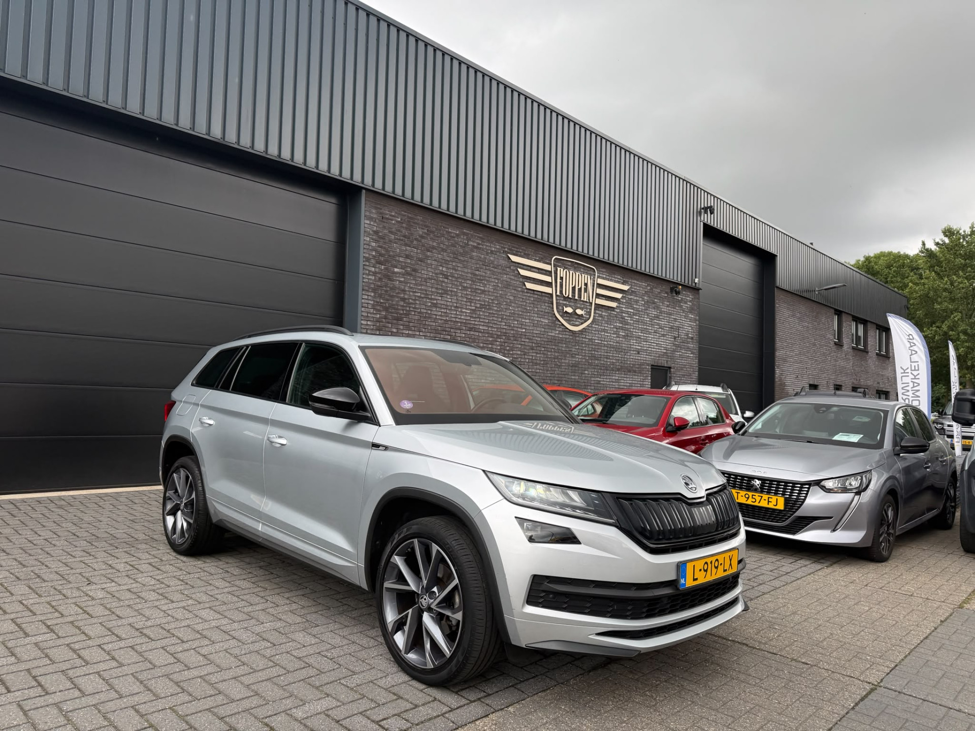 ŠKODA Kodiaq 1.5 TSI Sportline Business | 1E EIGENAAR | 3/6/12 MND GARANTIE | AUTOMAAT | PANO | LED | DAB | MEMORY | CARPLAY | DIGITAAL COCKPIT | TREKHAAK |