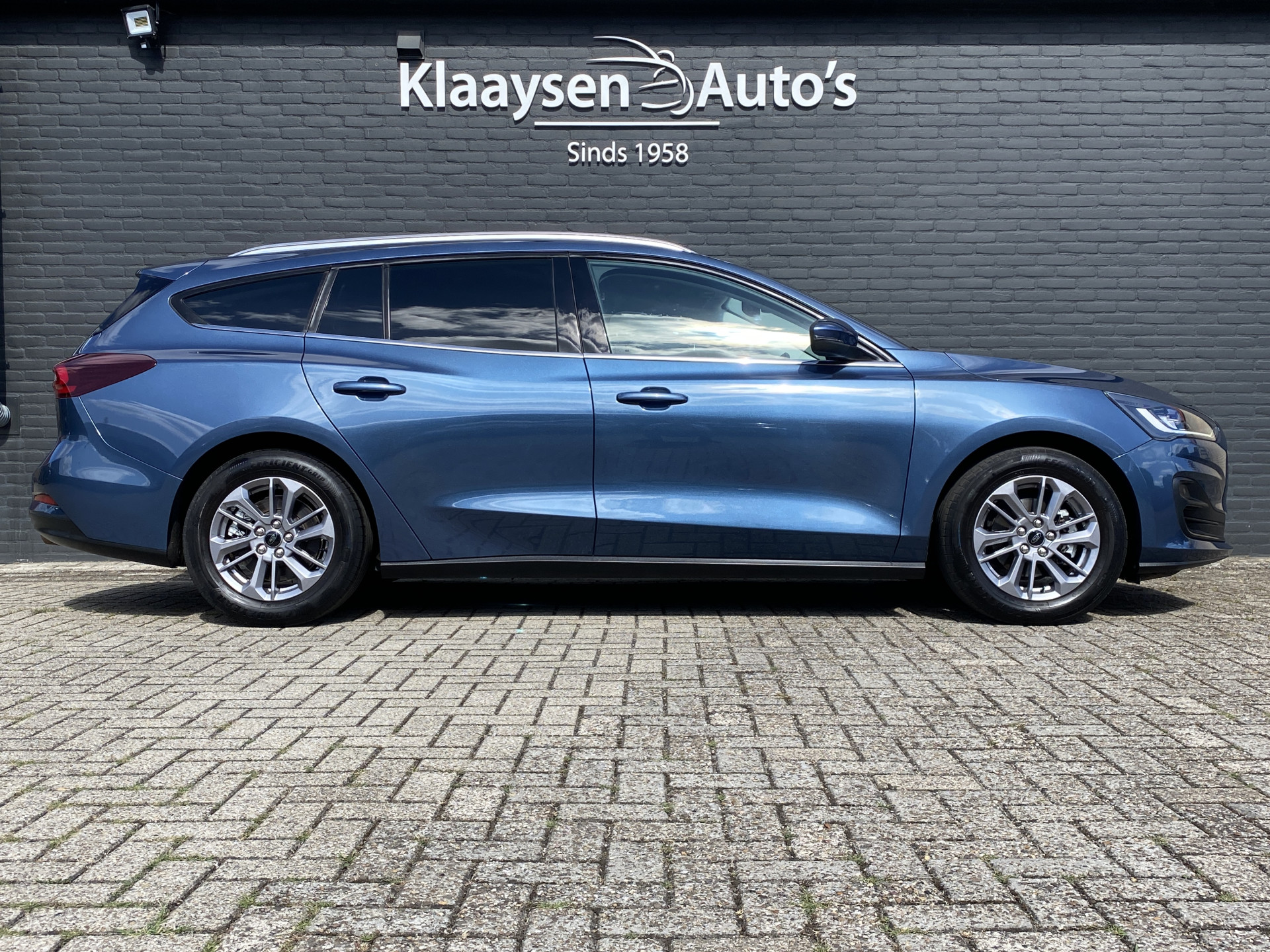 Ford Focus Wagon 1.0 EcoBoost Hybrid 155 pk Titanium AUT. | 1e eigenaar | dealer onderh. | navigatie | cruise control | BTW auto