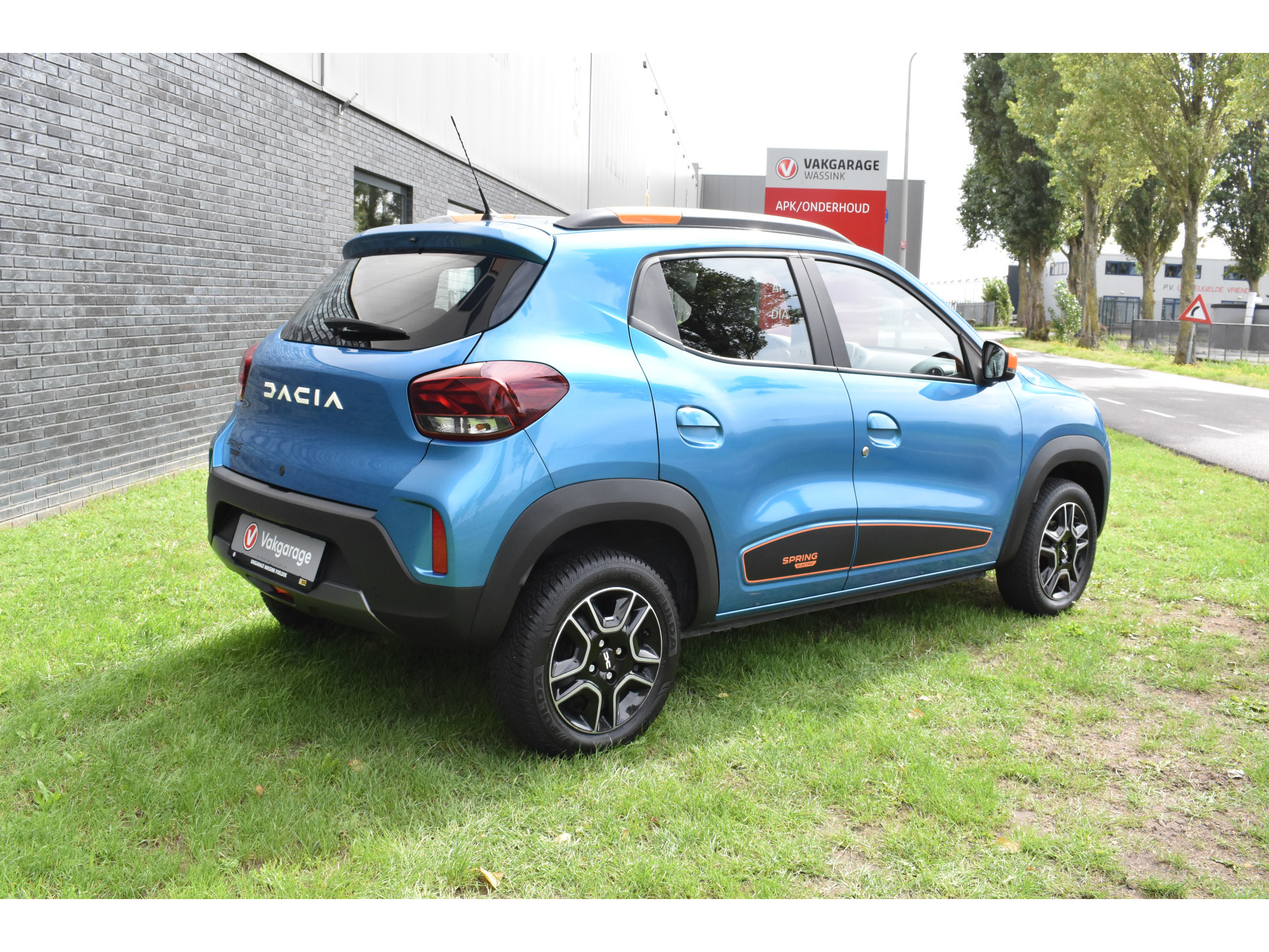 Dacia Spring Essential 27 kWh vol electric navigatie pdc Leer