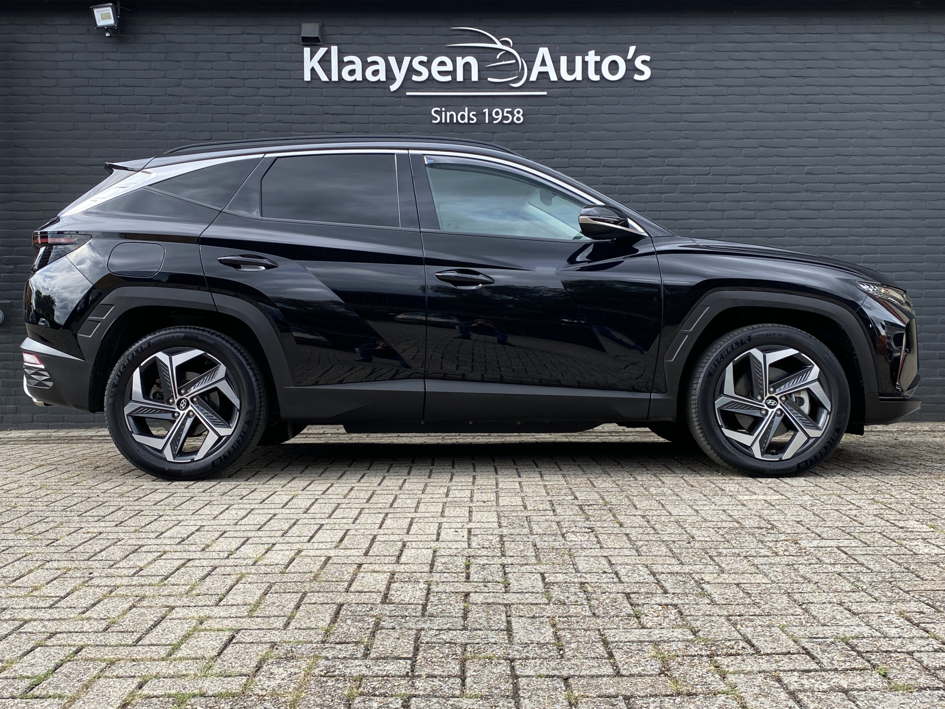Hyundai Tucson 1.6 T-GDI PHEV 265 pk Comfort Smart 4WD | 1e eigenaar | navigatie | elektr. a. klep | adapt. cruise | camera | BTW auto