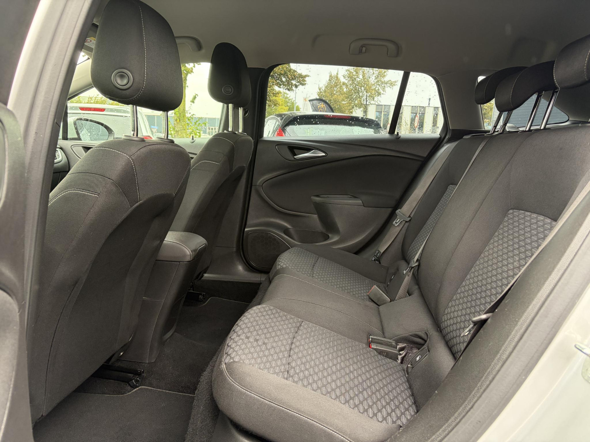 Opel Astra Sports Tourer 1.0 Online Edition ✓2e Eigenaar✓Carplay✓Navi✓Trekhaak✓Net beurt gehad✓Clima✓Cruise✓Pdc V+A✓105pk✓N.A.P✓Lm velgen✓Apk tot 10-2027