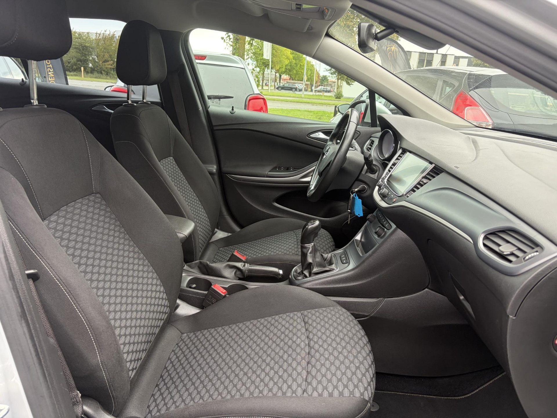 Opel Astra Sports Tourer 1.0 Online Edition ✓2e Eigenaar✓Carplay✓Navi✓Trekhaak✓Net beurt gehad✓Clima✓Cruise✓Pdc V+A✓105pk✓N.A.P✓Lm velgen✓Apk tot 10-2027