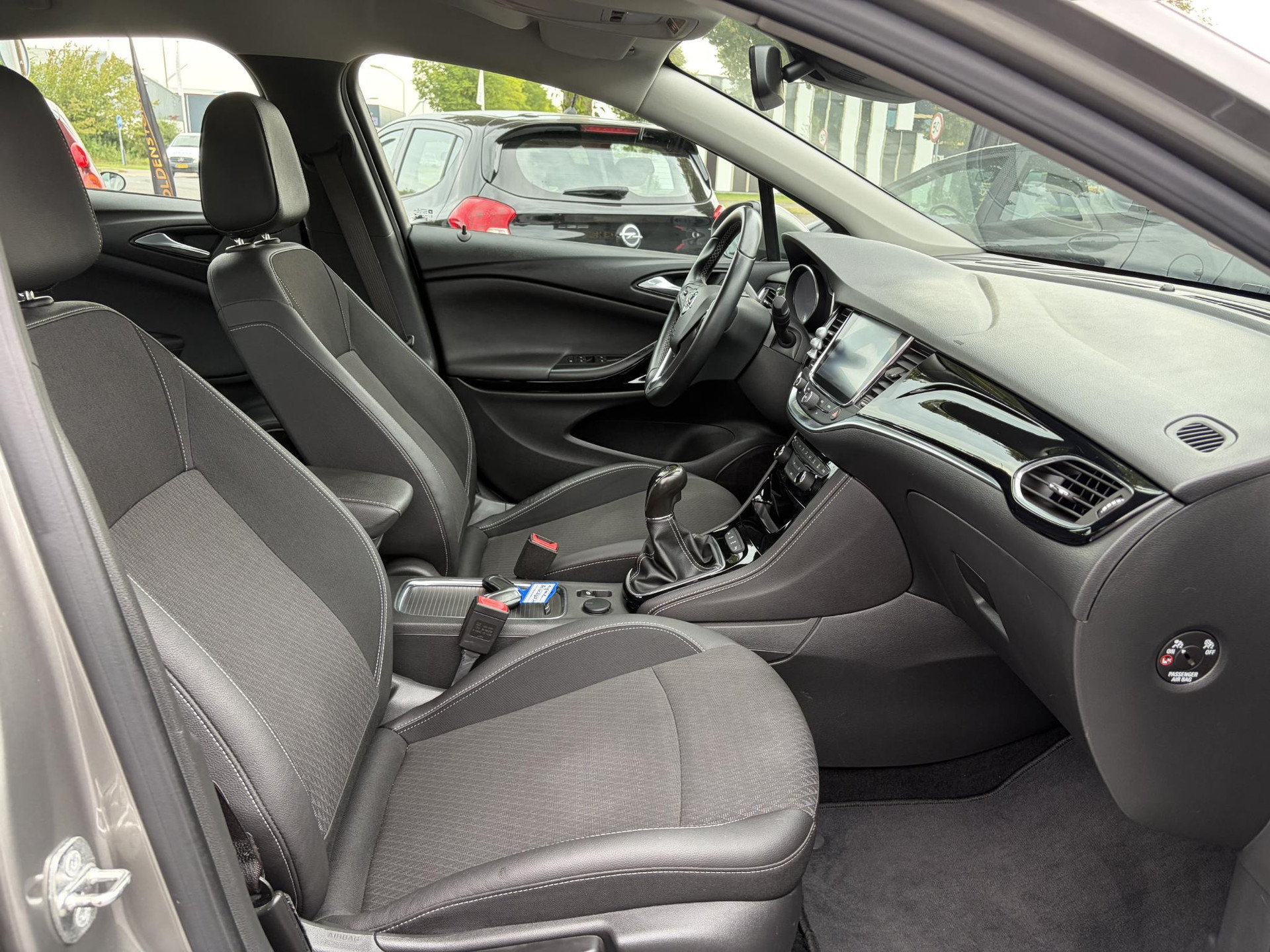 Opel Astra 1.4 Innovation ✓2e Eigenaar✓Carplay✓Navi✓150pk✓Keyless✓6 Bak✓Halfleder✓Rijstrooksensor✓Pdc V+A✓Clima✓Cruise✓Lm velgen✓Bj 12-2016✓N.A.P✓Apk tot 09-2027