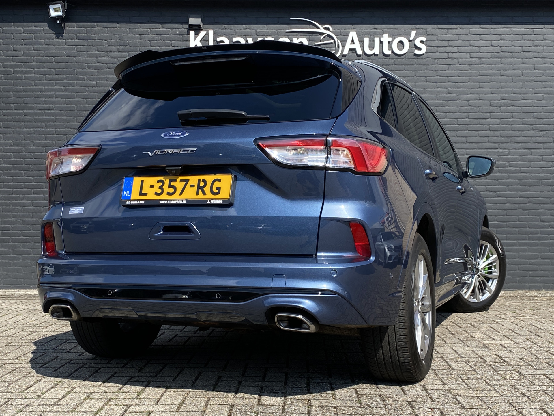 Ford Kuga 2.5 PHEV Vignale 225 pk | dealer onderh. | panoramadak | leder interieur | elektr. v. stoelen | navigatie | B&O audio