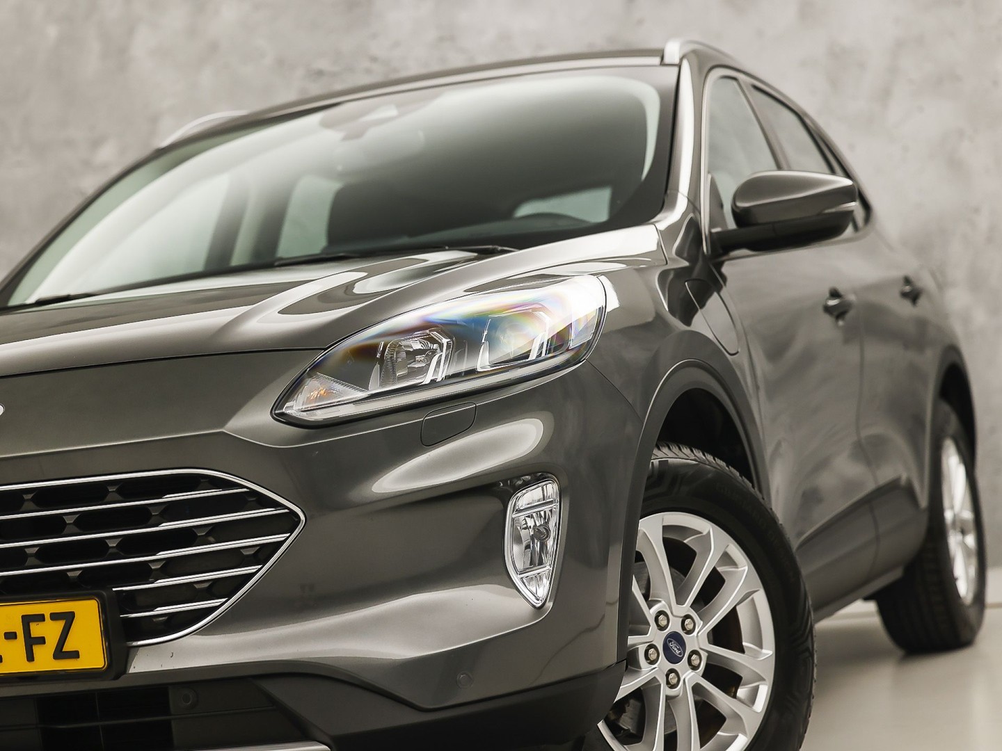 Ford Kuga 2.5 PHEV Titanium X 225Pk Automaat (SOH 87,6%, VIRTUAL COCKPIT, APPLE CARPLAY, STUUR/STOELVERWARMING, KEYLESS, SPORTSTOELEN, CAMERA, TREKHAAK, NIEUWSTAAT)