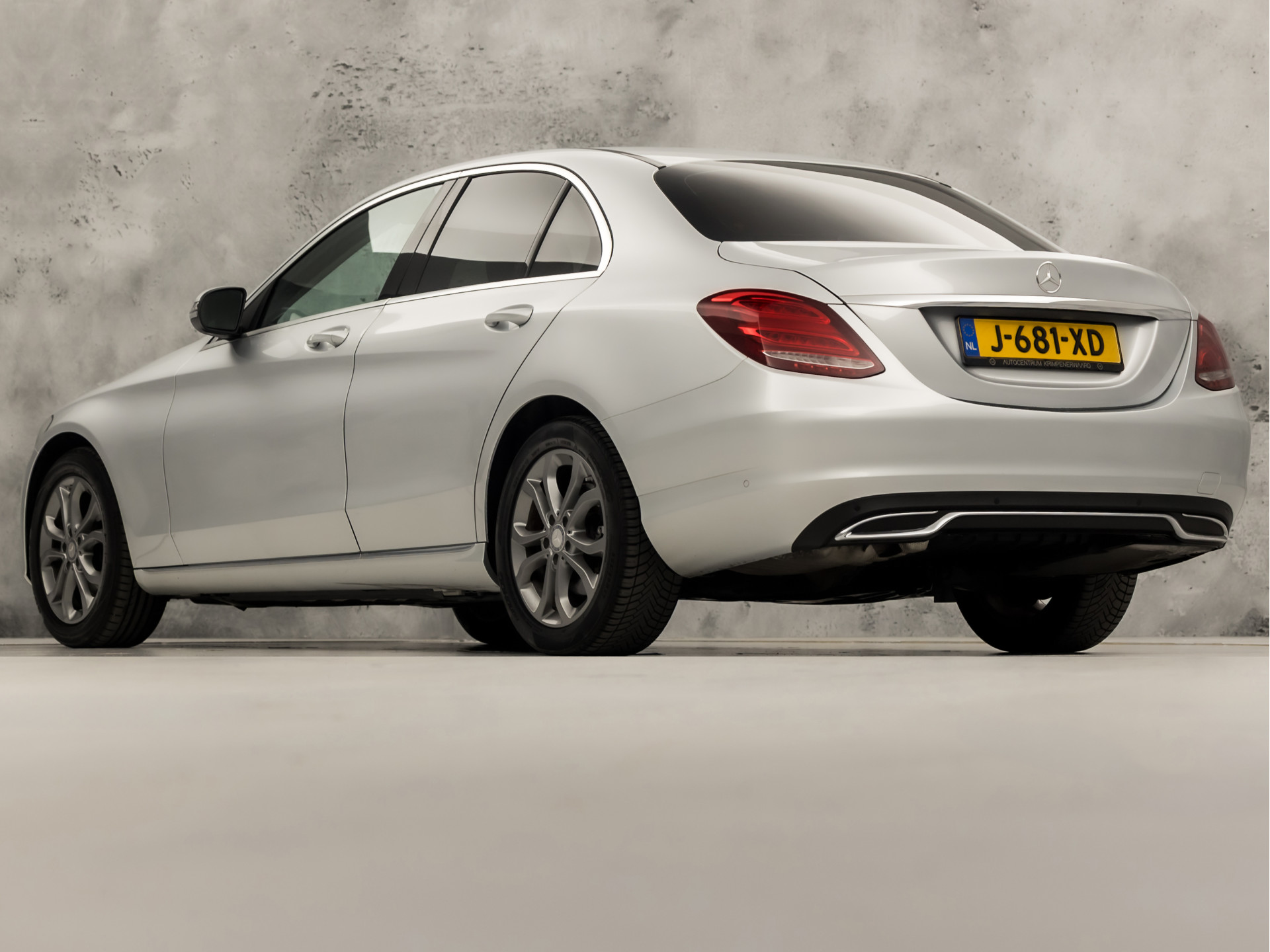 Mercedes-Benz C-Klasse 180 Sport 156Pk Automaat (NAVIGATIE, LEDER, SFEERVERLICHTING, GETINT GLAS, STOELVERWARMING, SPORTSTOELEN, CRUISE, NIEUWE APK, NIEUWSTAAT)